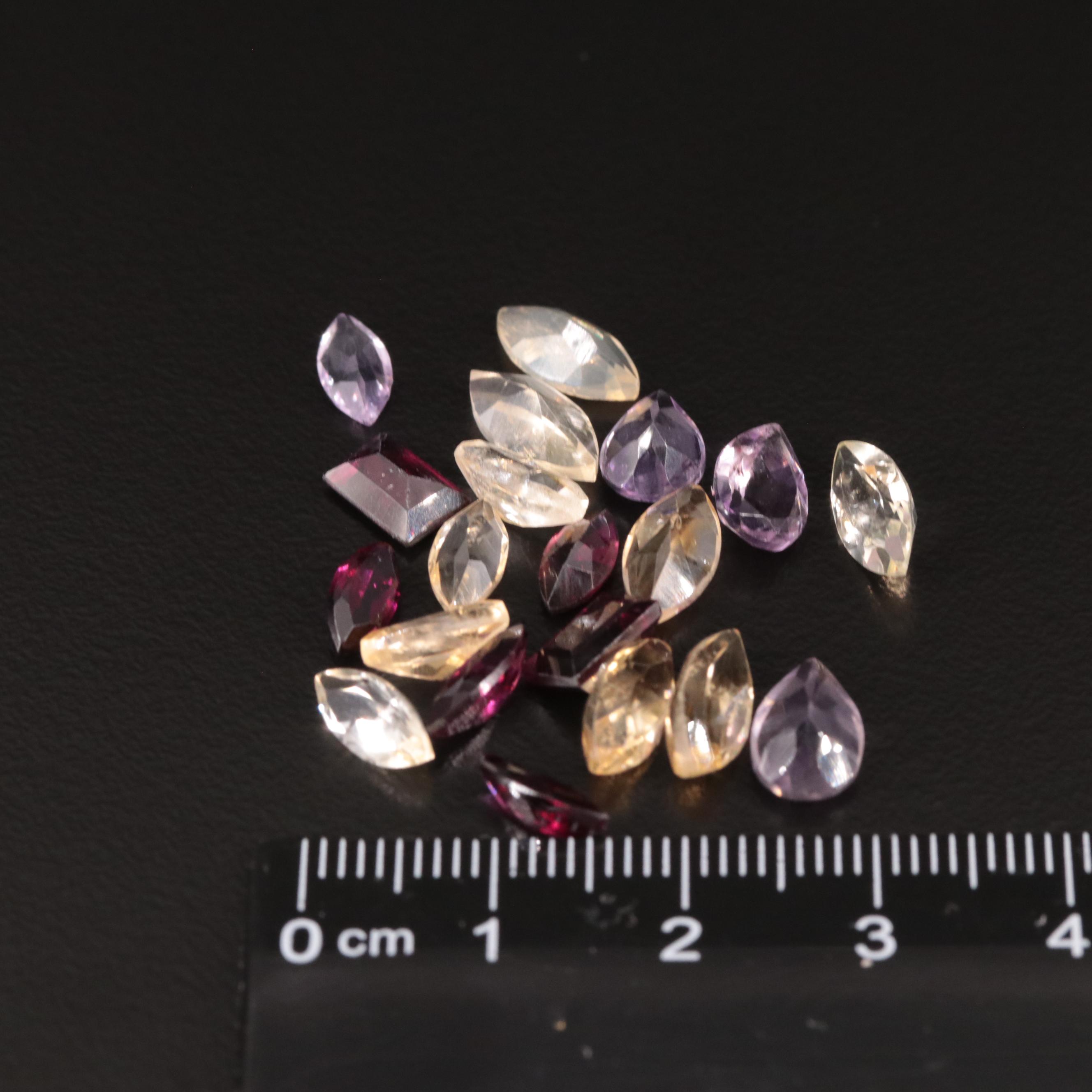 Loose 18.20 CTW Amethyst, Citrine, and Garnet Lot