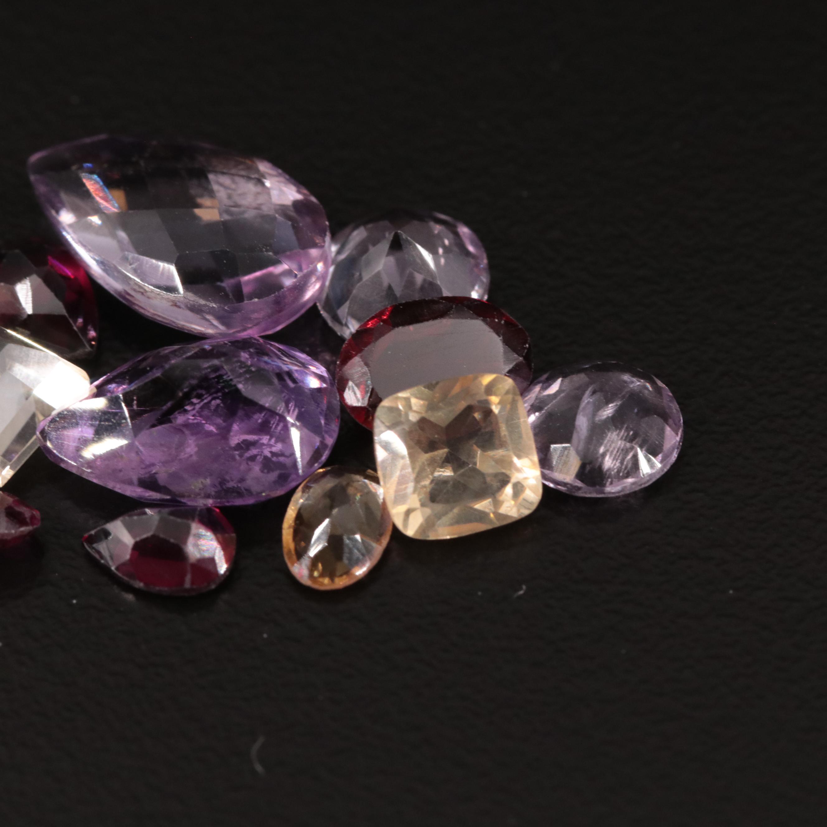 Loose 14.85 CTW Amethyst, Citrine, and Garnet Lot