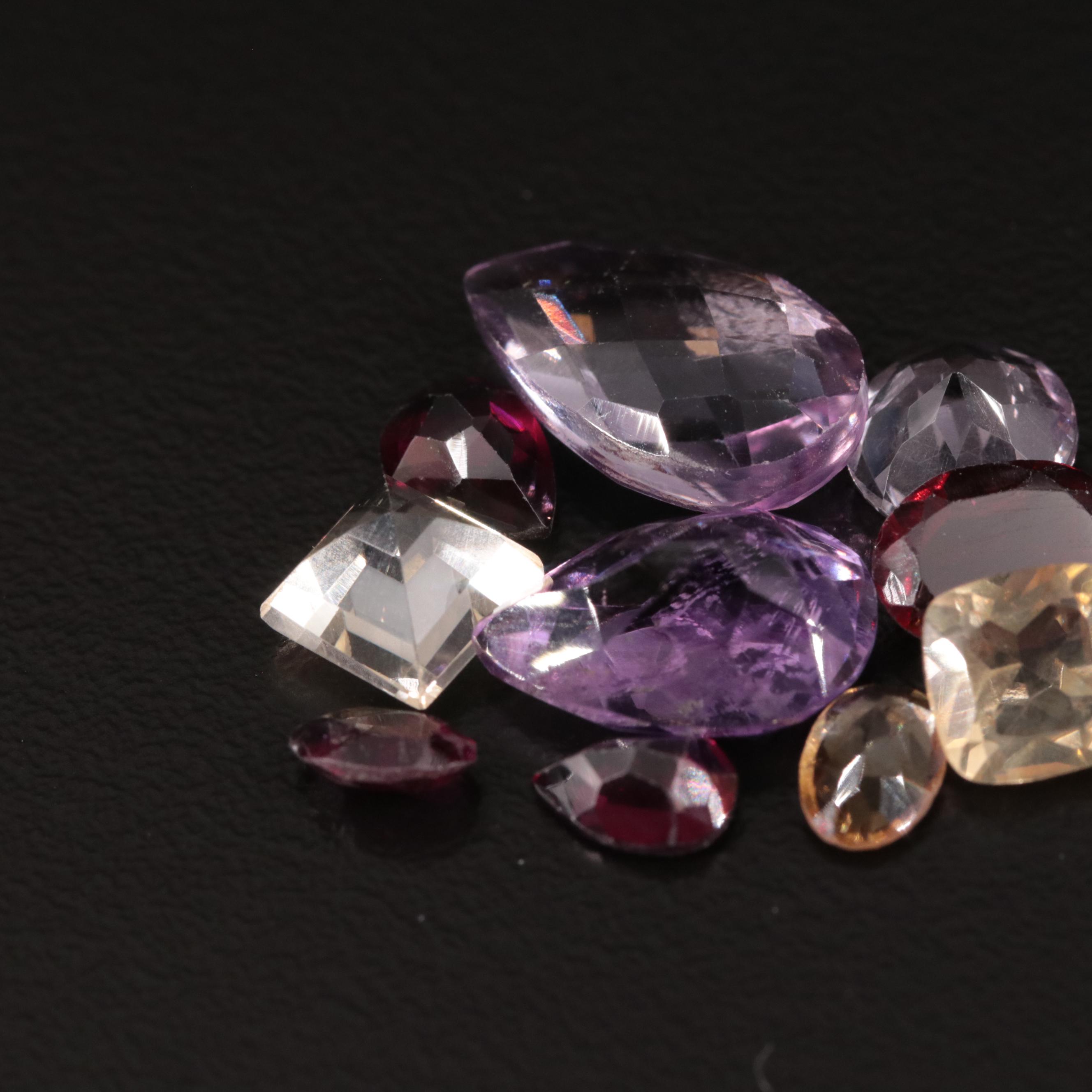 Loose 14.85 CTW Amethyst, Citrine, and Garnet Lot