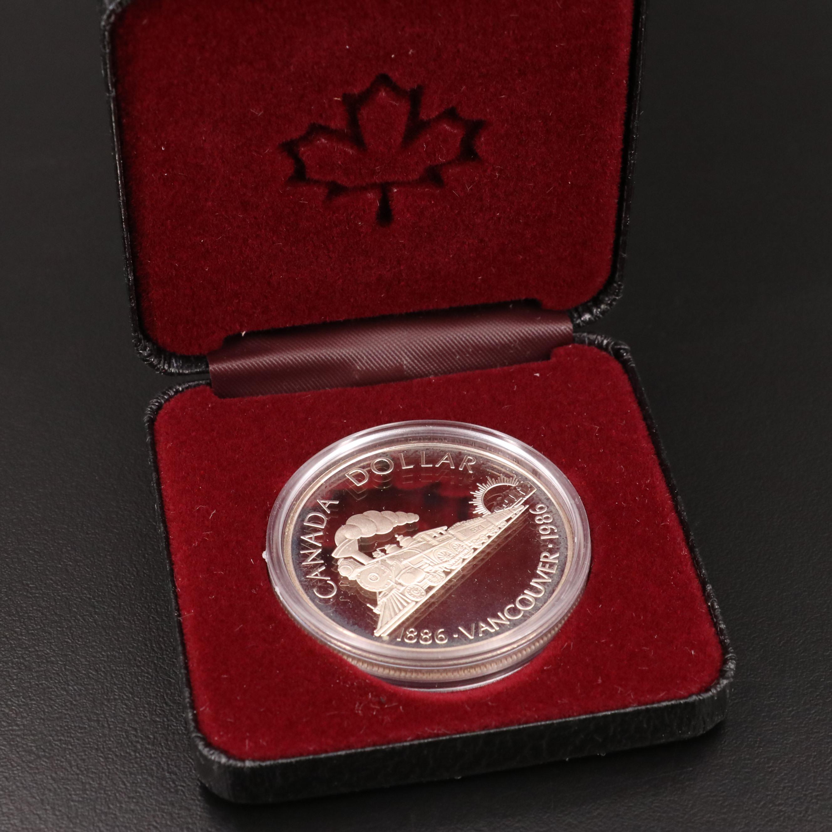 Nine 1986 Vancouver Centennial Canadian Commemorative Proof Silver Dollars