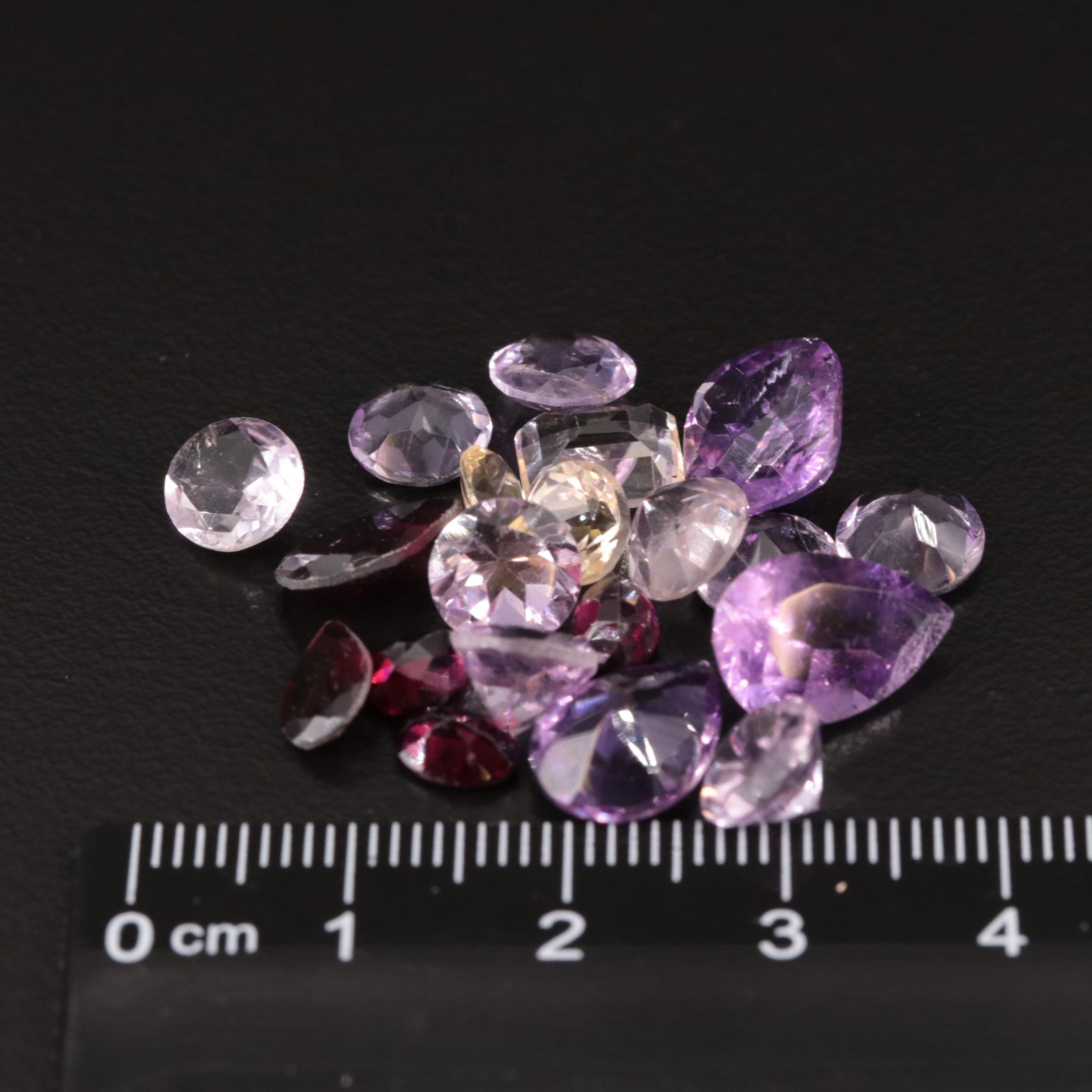 Loose 25.08 CTW Amethyst, Citrine, and Garnet Lot