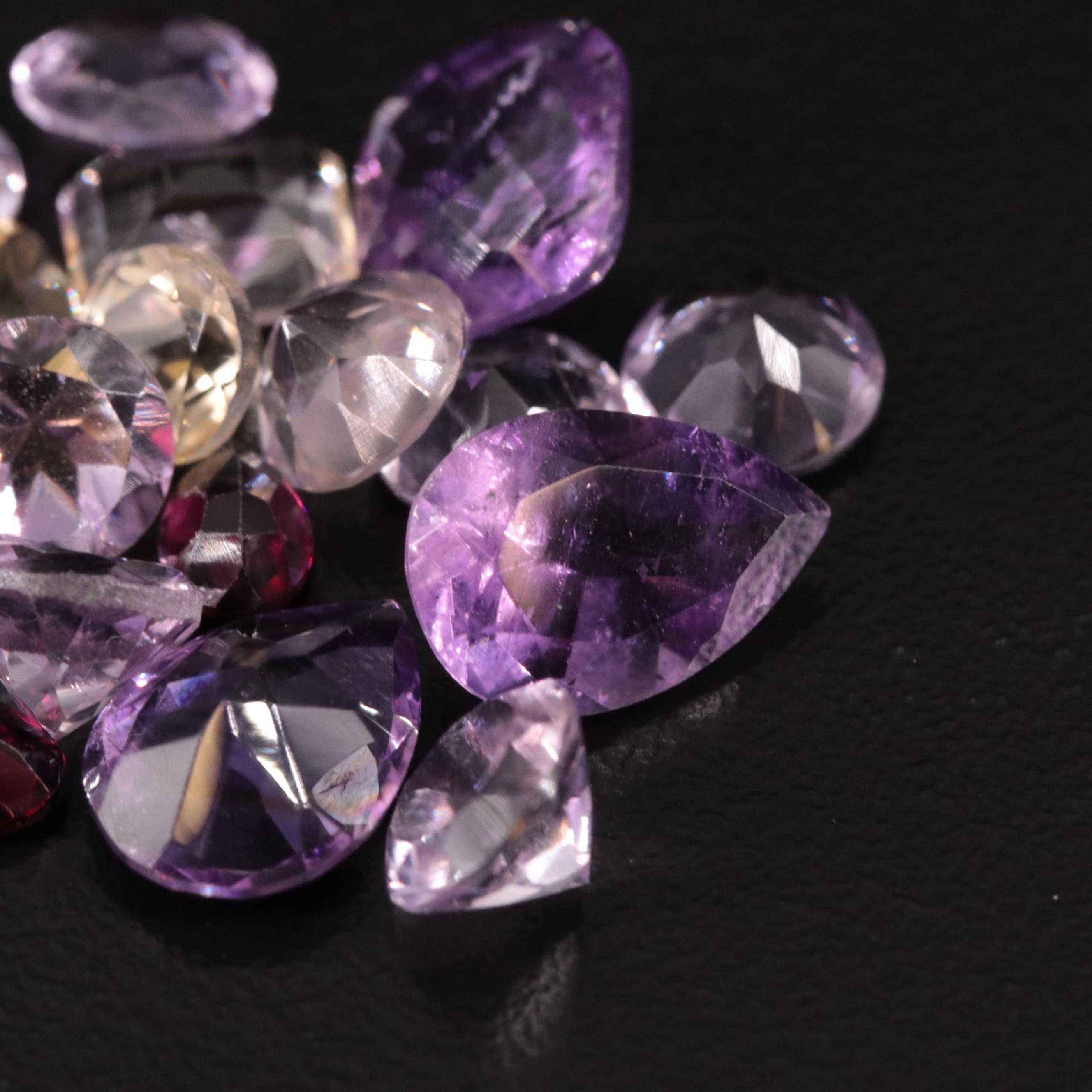 Loose 25.08 CTW Amethyst, Citrine, and Garnet Lot