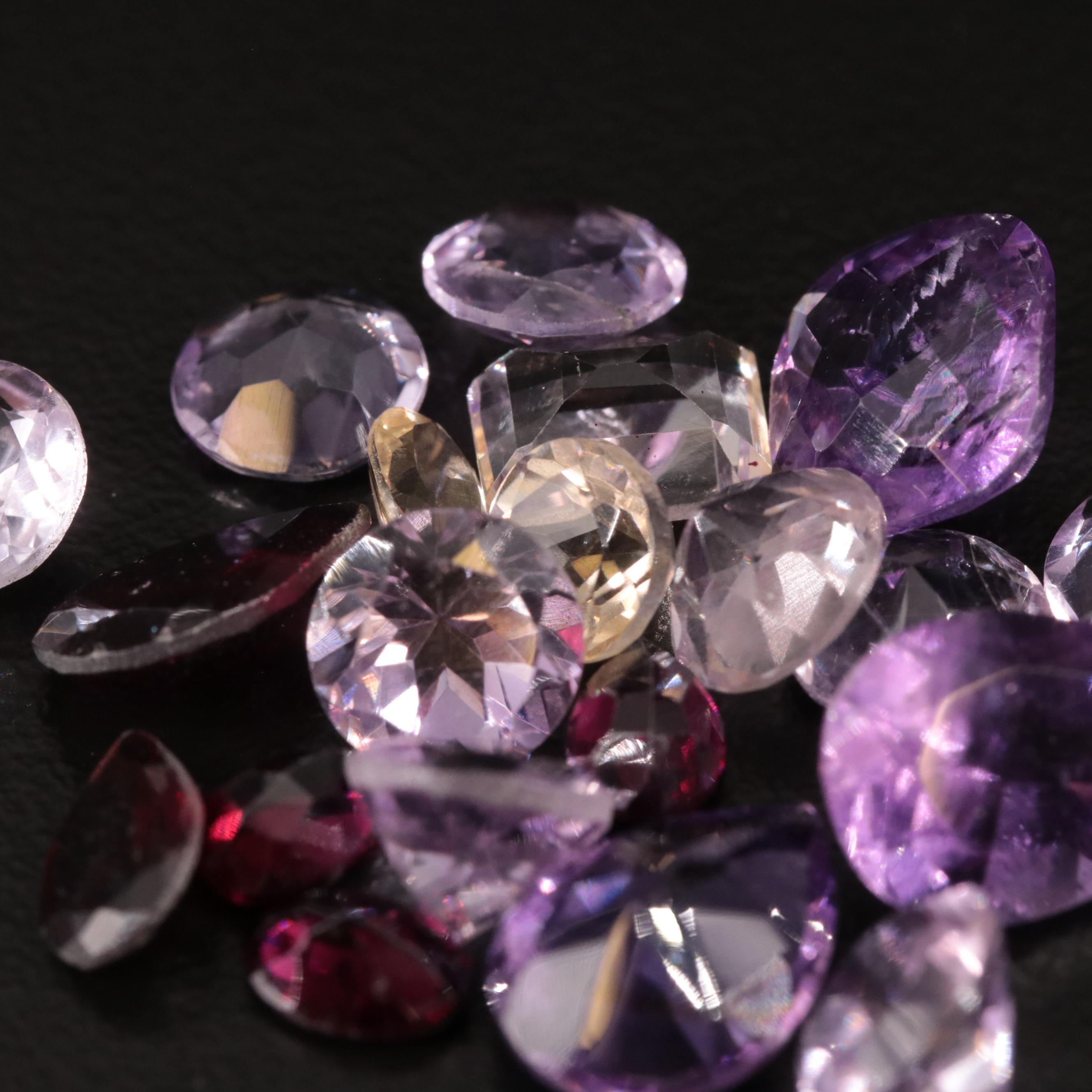 Loose 25.08 CTW Amethyst, Citrine, and Garnet Lot
