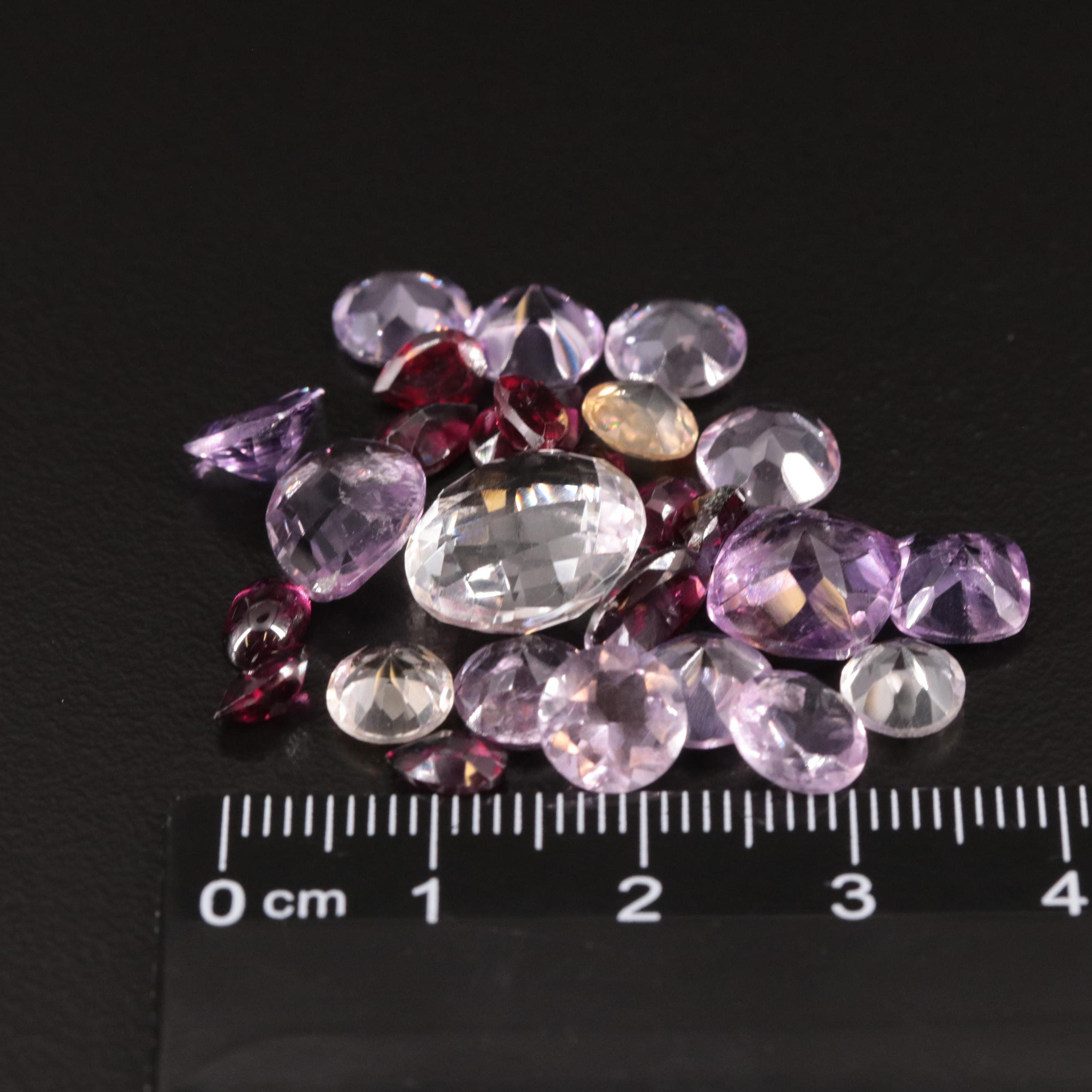 Loose 32.60 CTW Amethyst, Garnet and Citrine Lot