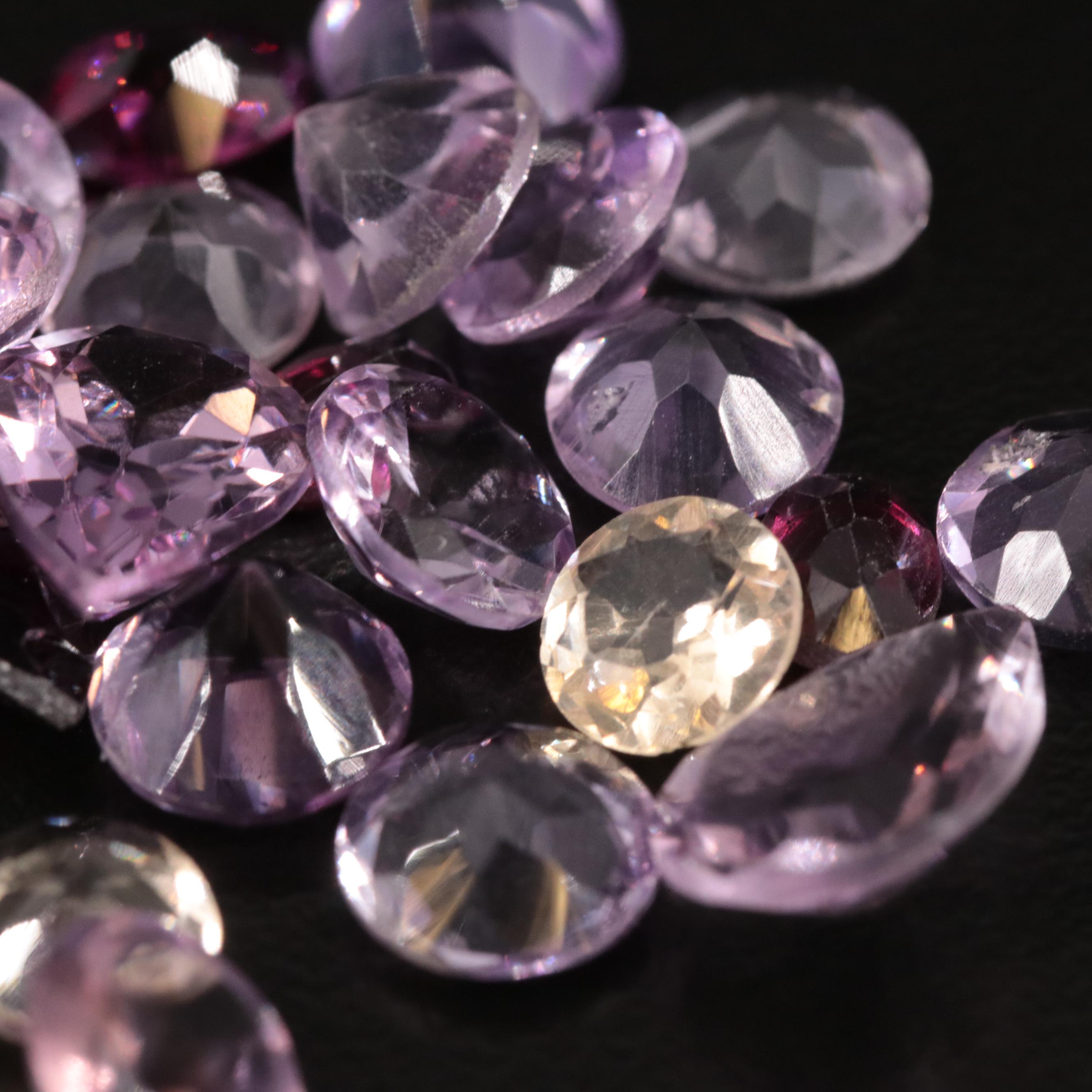 Loose 26.37 CTW Amethyst, Citrine and Garnet Lot