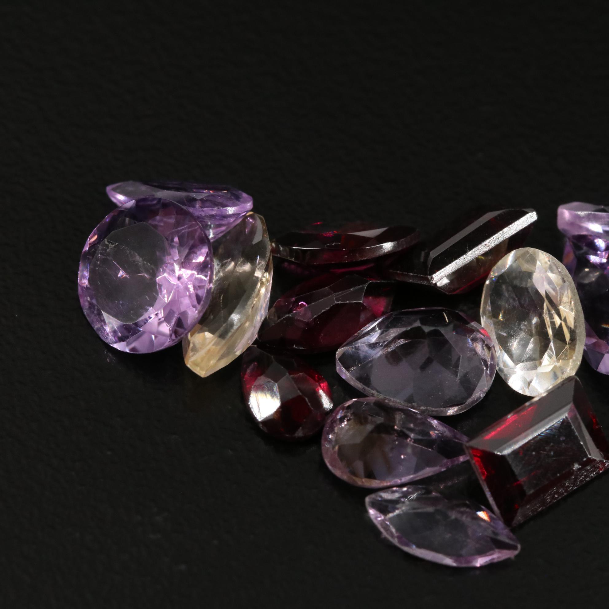 Loose 21.00 CTW Amethyst, Garnet, and Citrine Lot