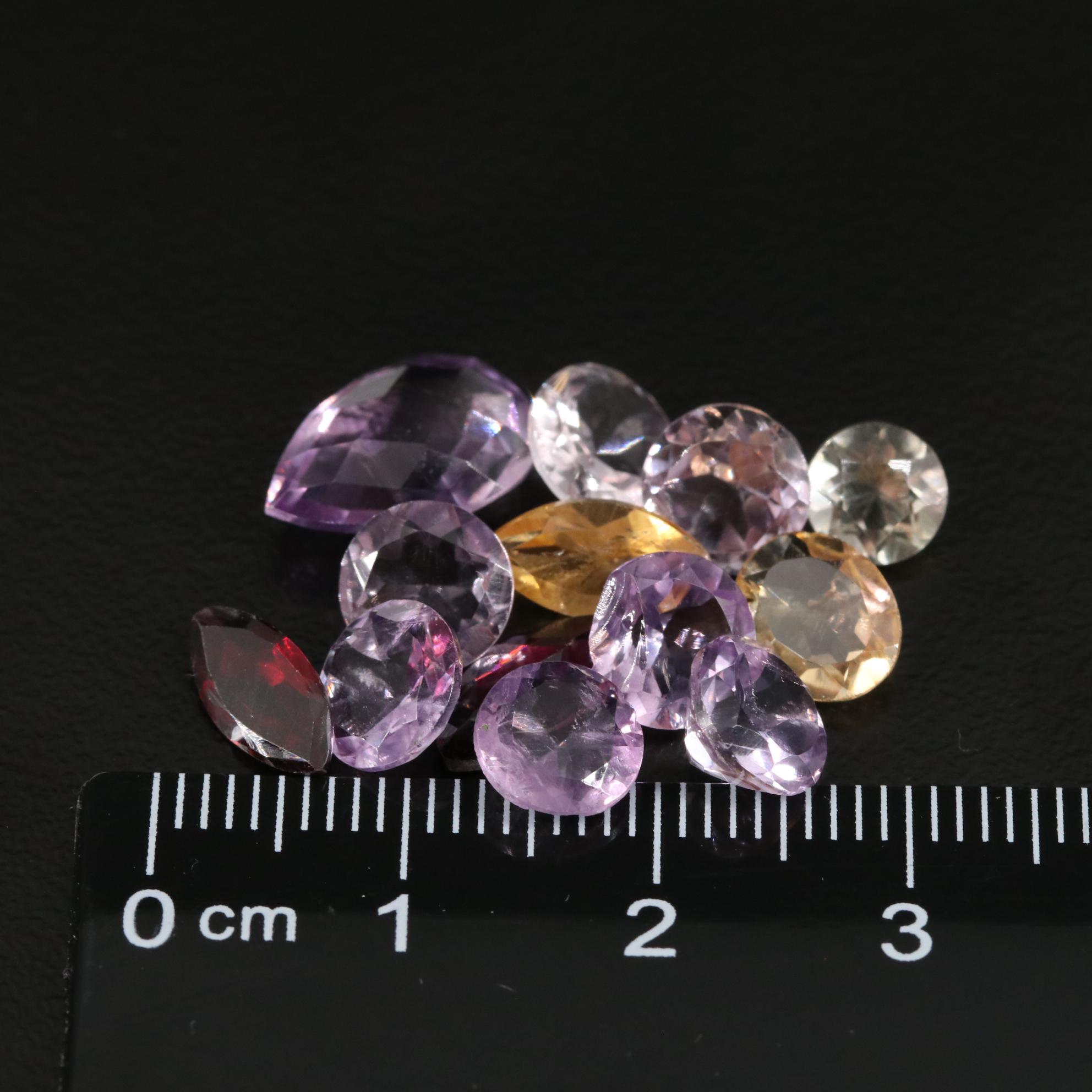 Loose 14.72 CTW Amethyst, Citrine, and Garnet Lot