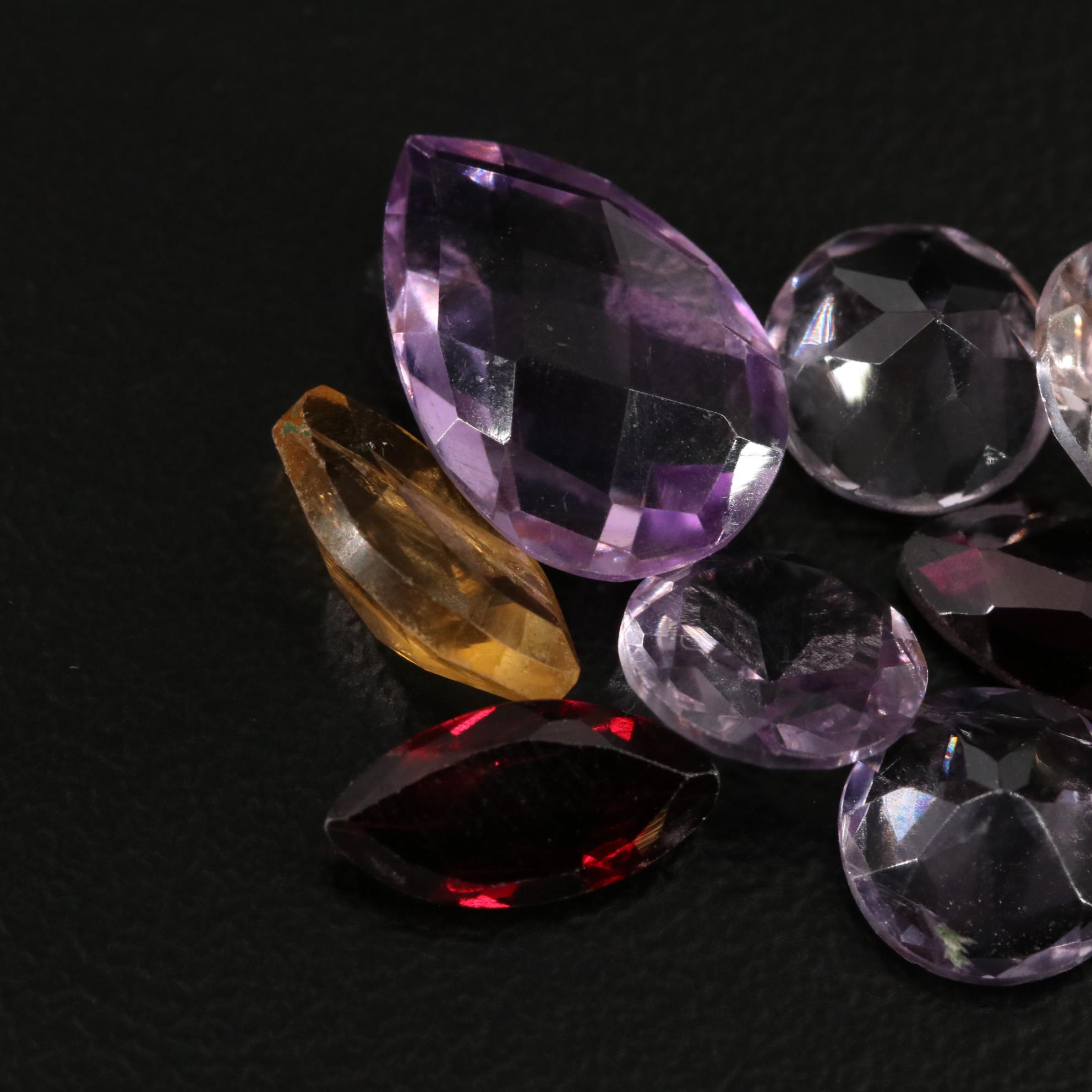 Loose 14.72 CTW Amethyst, Citrine, and Garnet Lot
