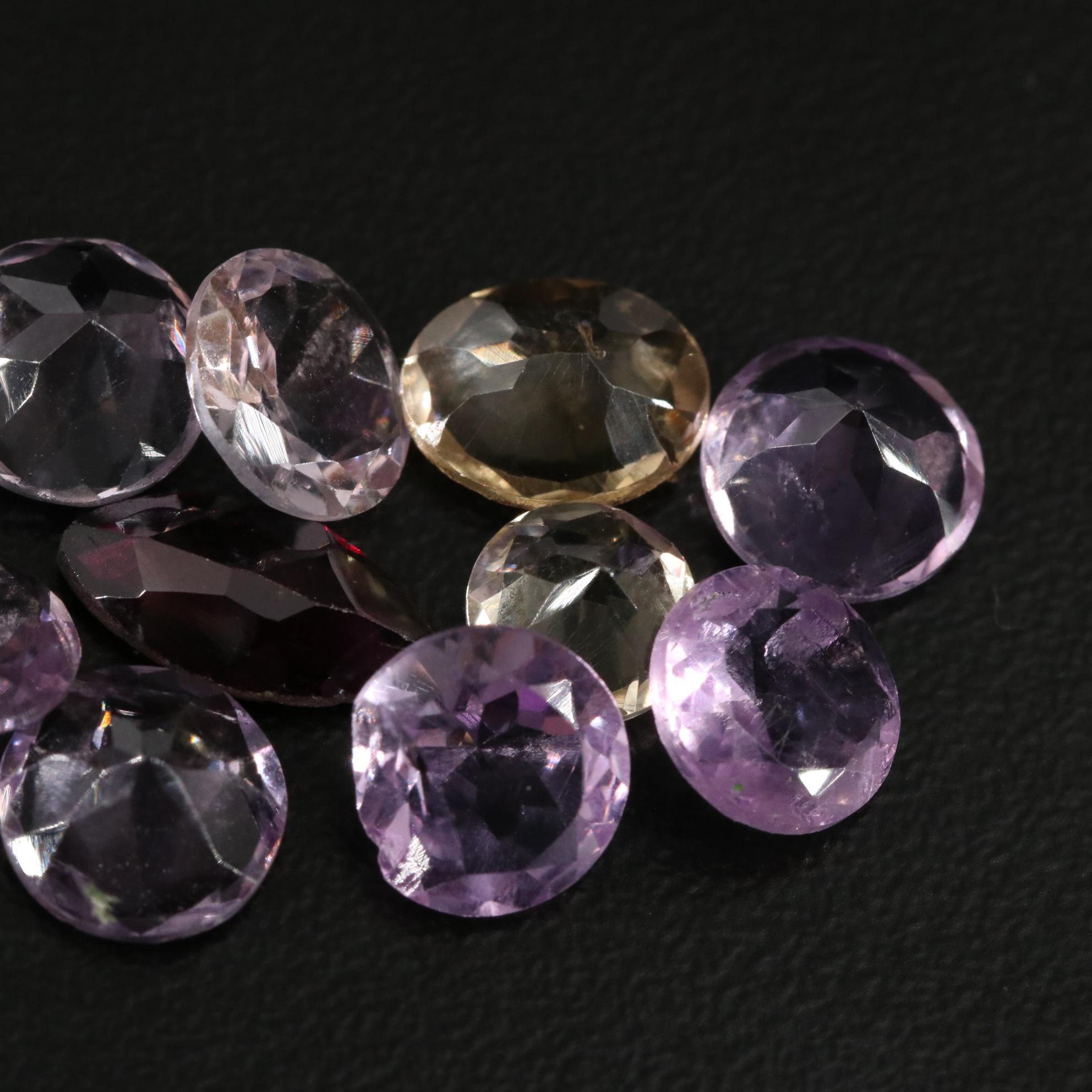 Loose 14.72 CTW Amethyst, Citrine, and Garnet Lot