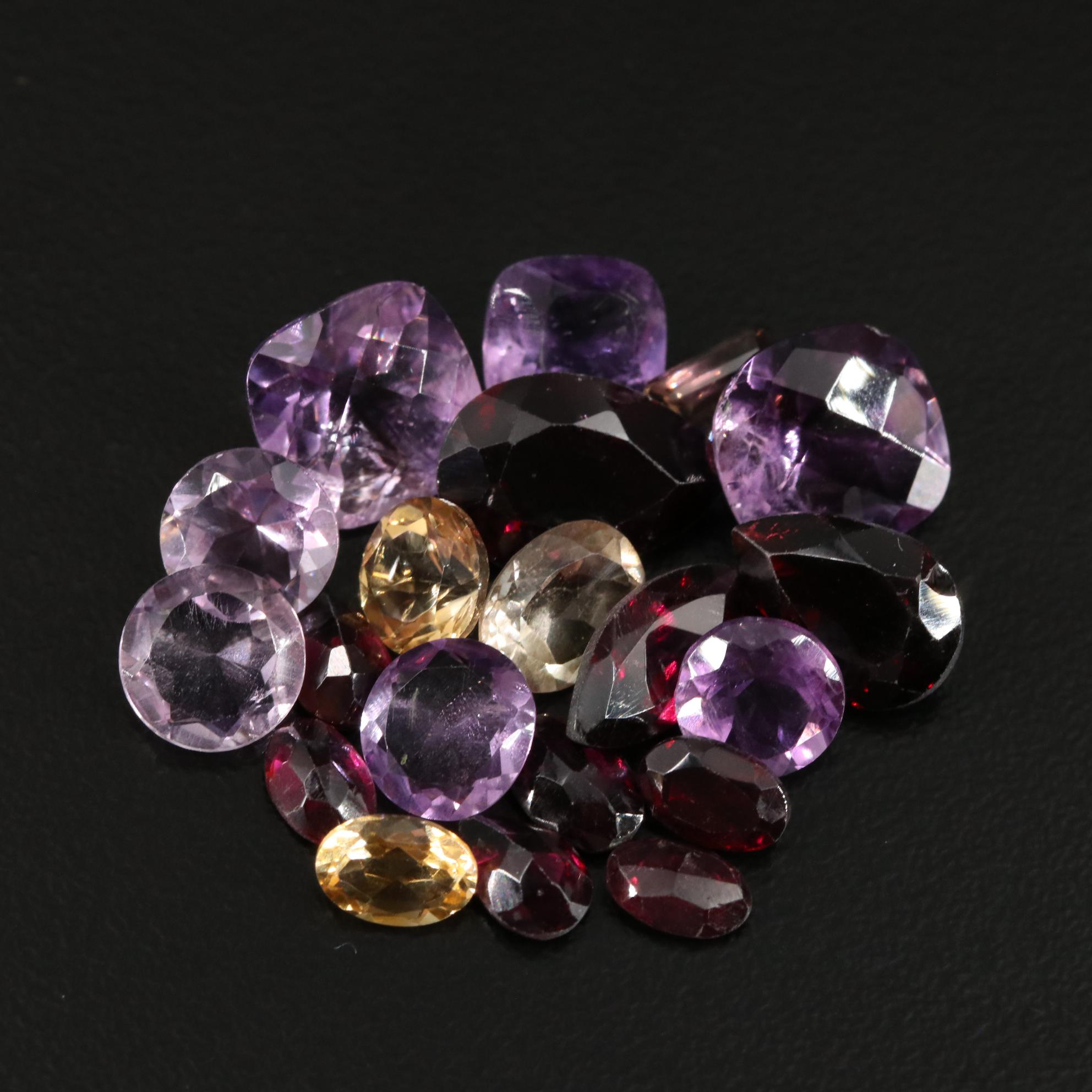 Loose 23.65 CTW Amethyst, Citrine, and Garnet Lot