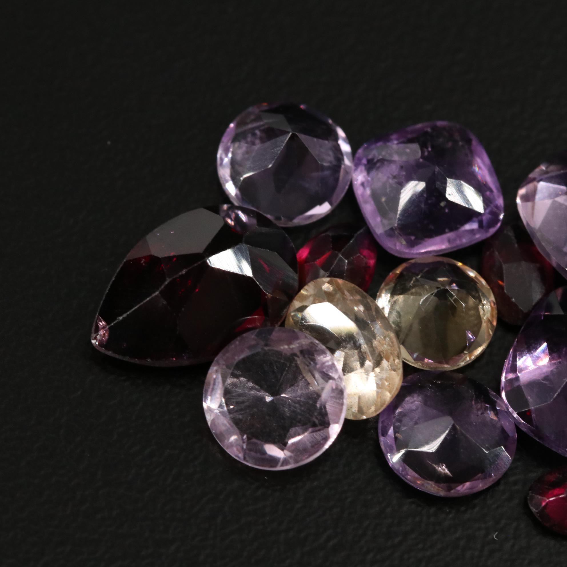 Loose 23.65 CTW Amethyst, Citrine, and Garnet Lot