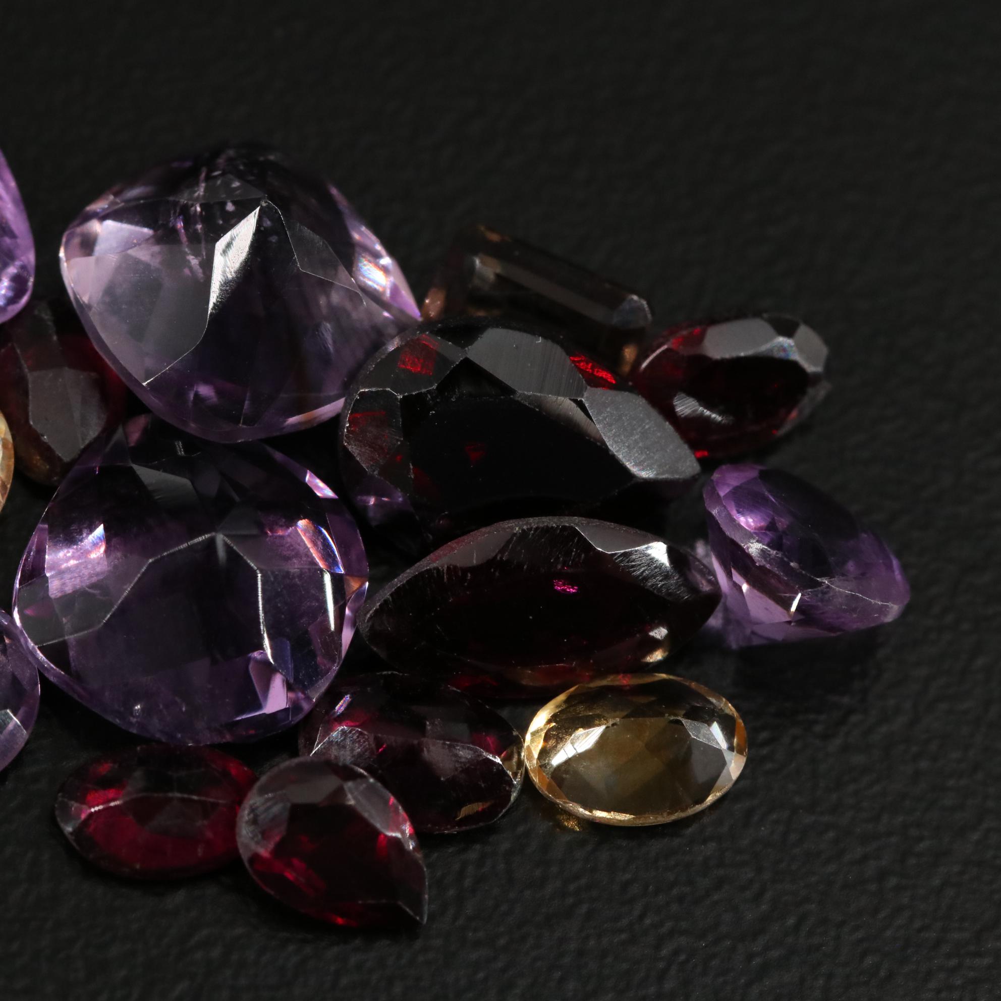 Loose 23.65 CTW Amethyst, Citrine, and Garnet Lot