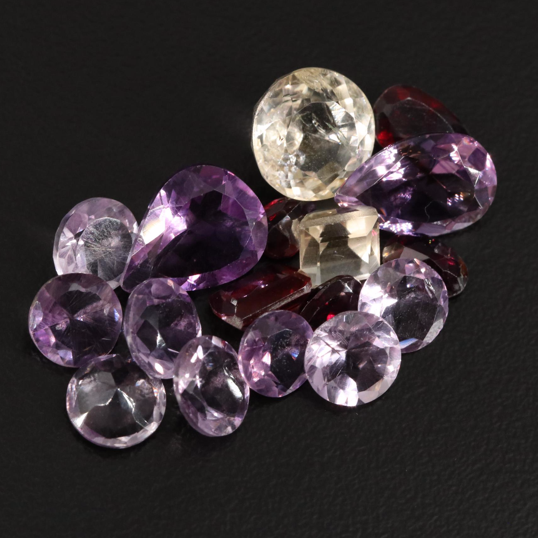Loose 23.22 CTW Amethyst, Citrine, and Garnet Lot