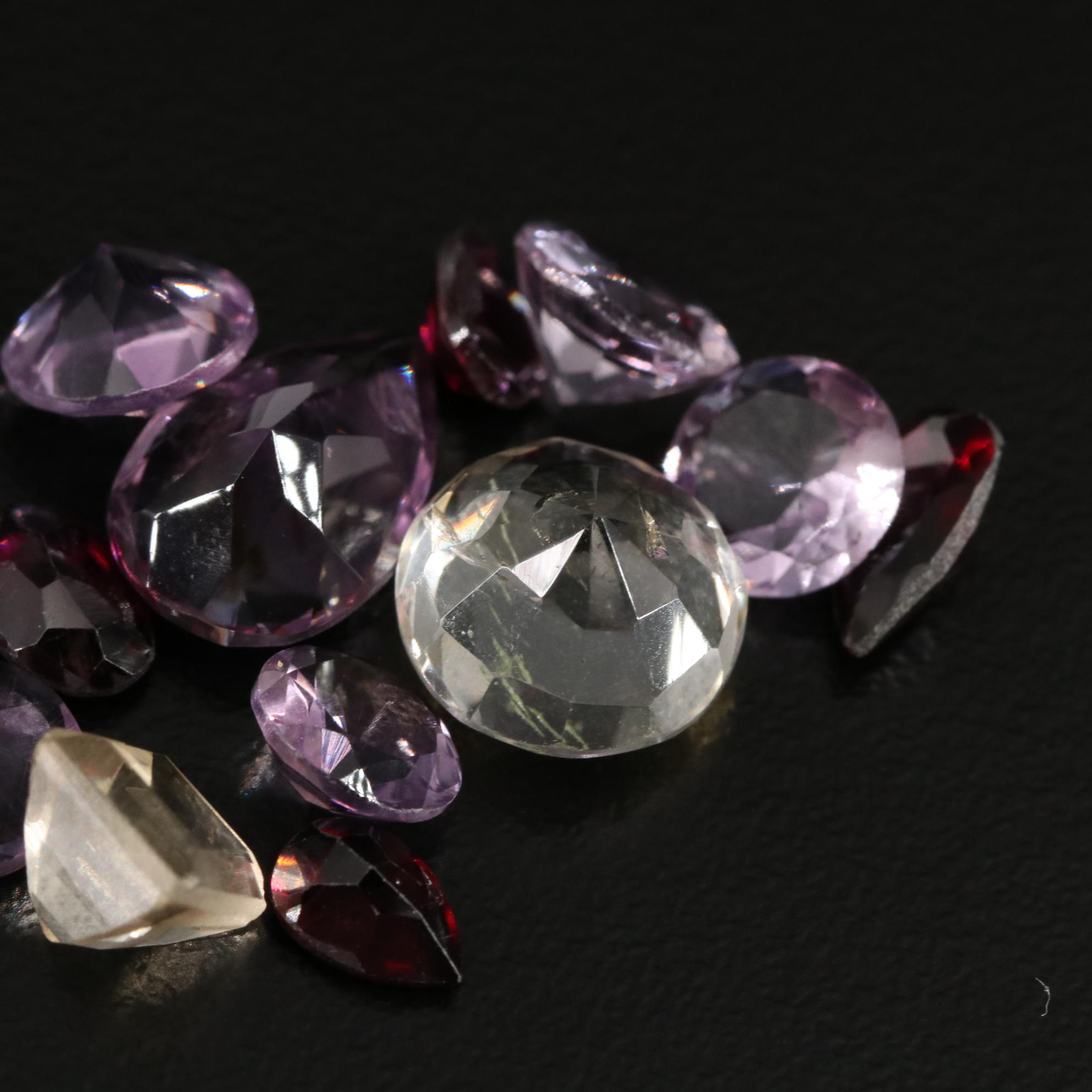 Loose 23.22 CTW Amethyst, Citrine, and Garnet Lot