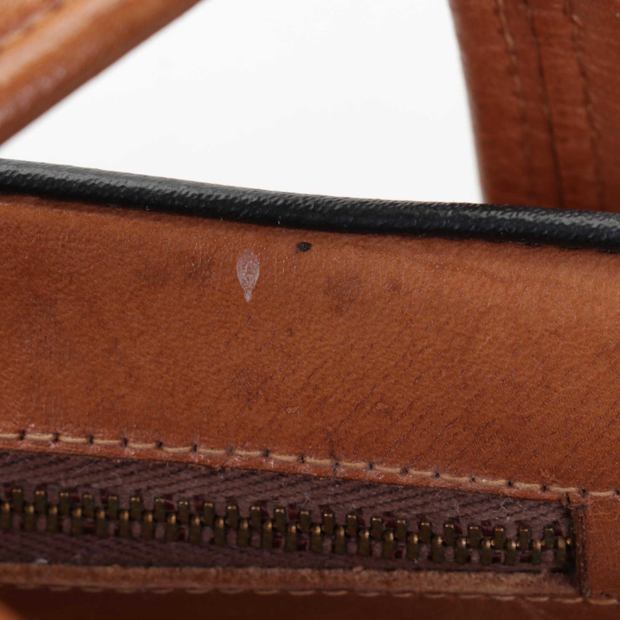 Hand Tooled Leather Clutch and Handbag