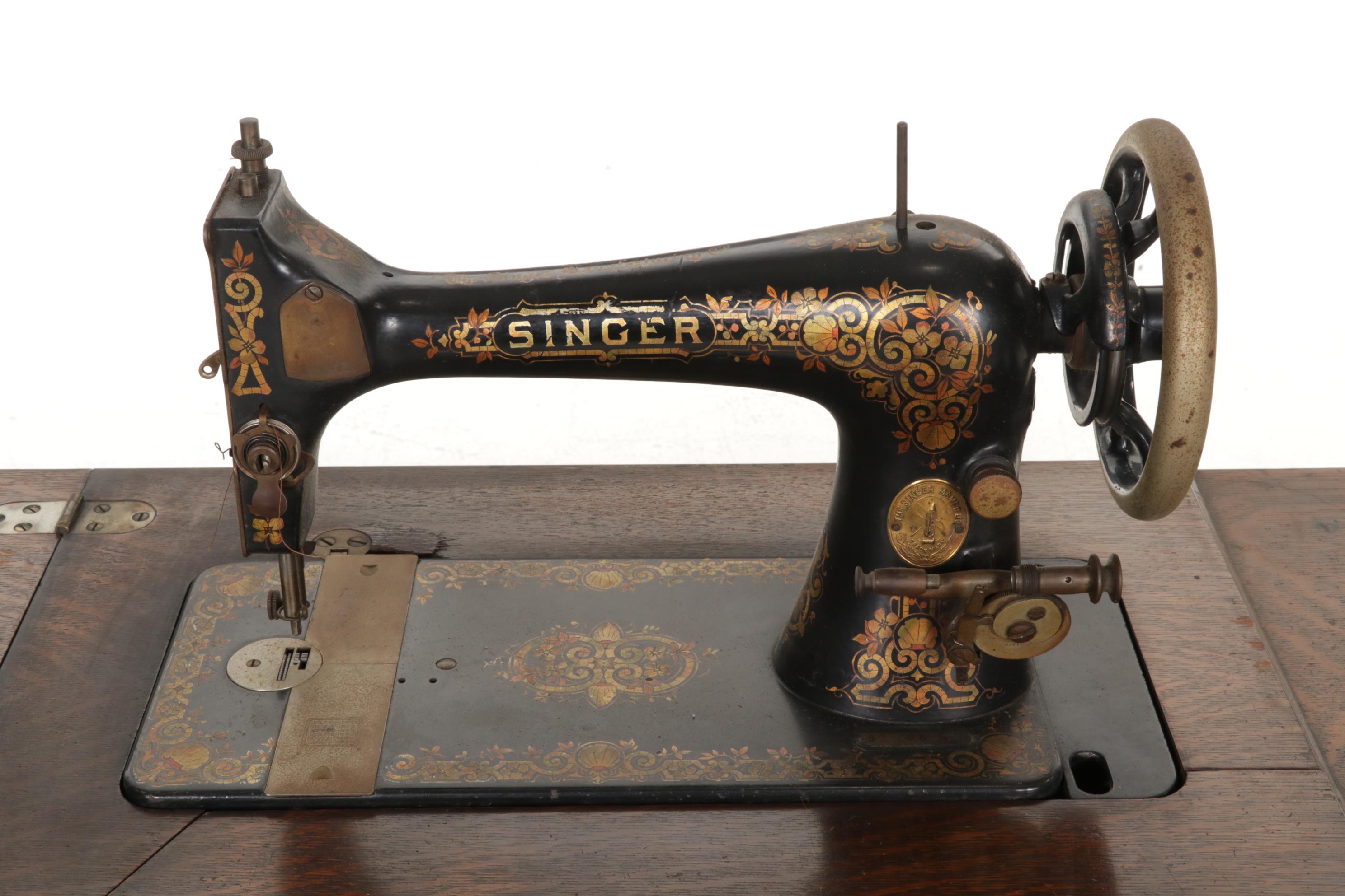 Singer Model 27-4 Treadle Sewing Machine in Oak and Iron Cabinet, Circa 1906