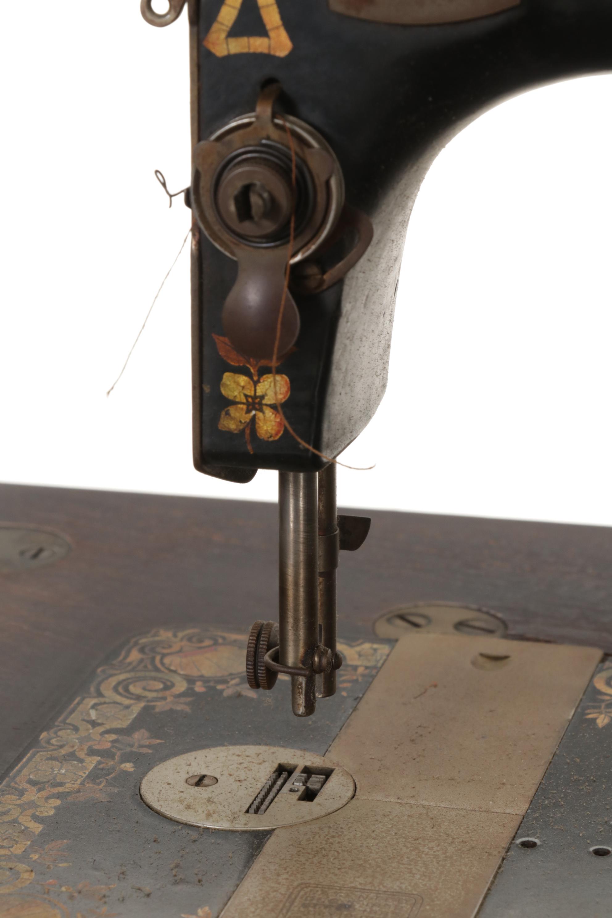 Singer Model 27-4 Treadle Sewing Machine in Oak and Iron Cabinet, Circa 1906
