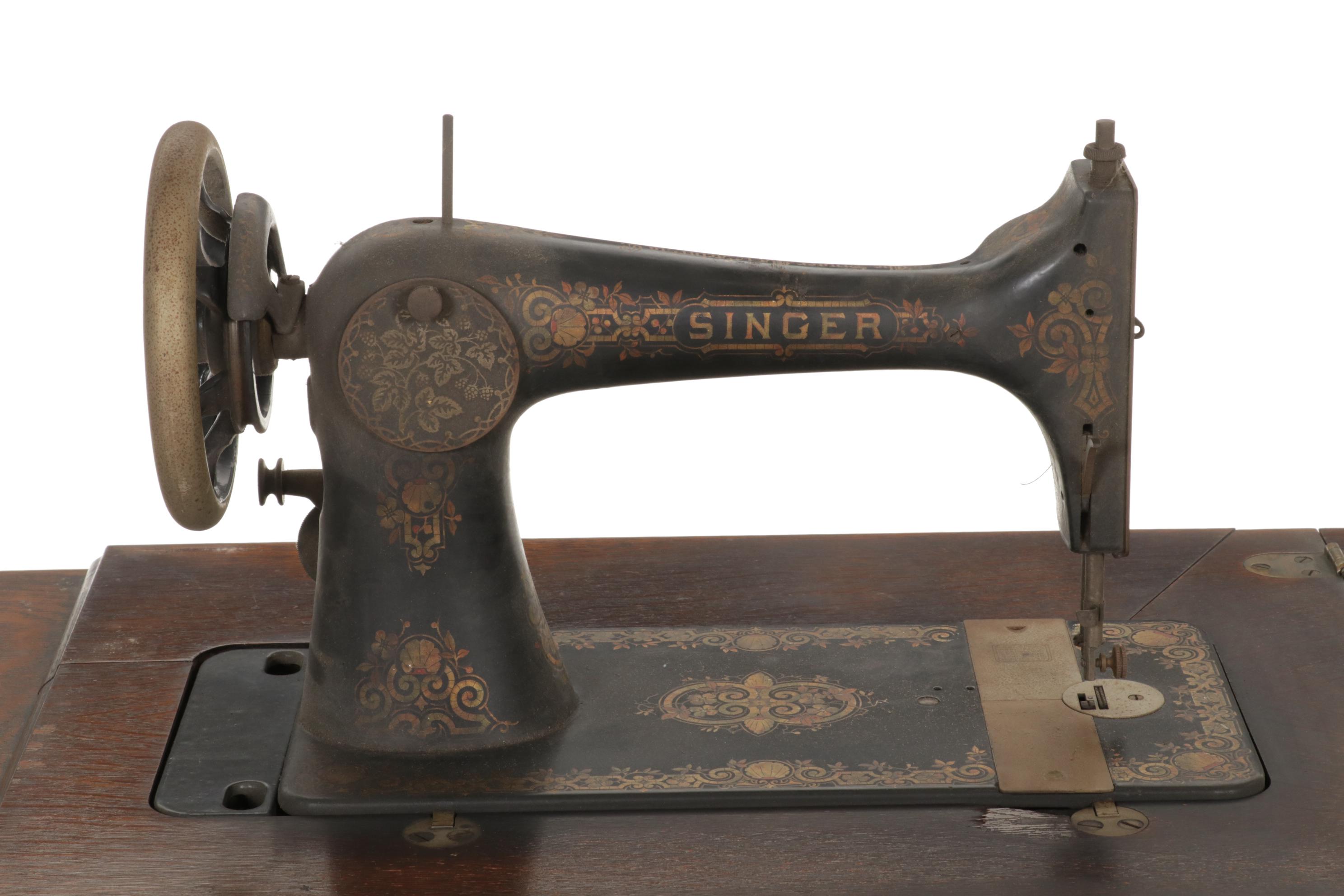 Singer Model 27-4 Treadle Sewing Machine in Oak and Iron Cabinet, Circa 1906