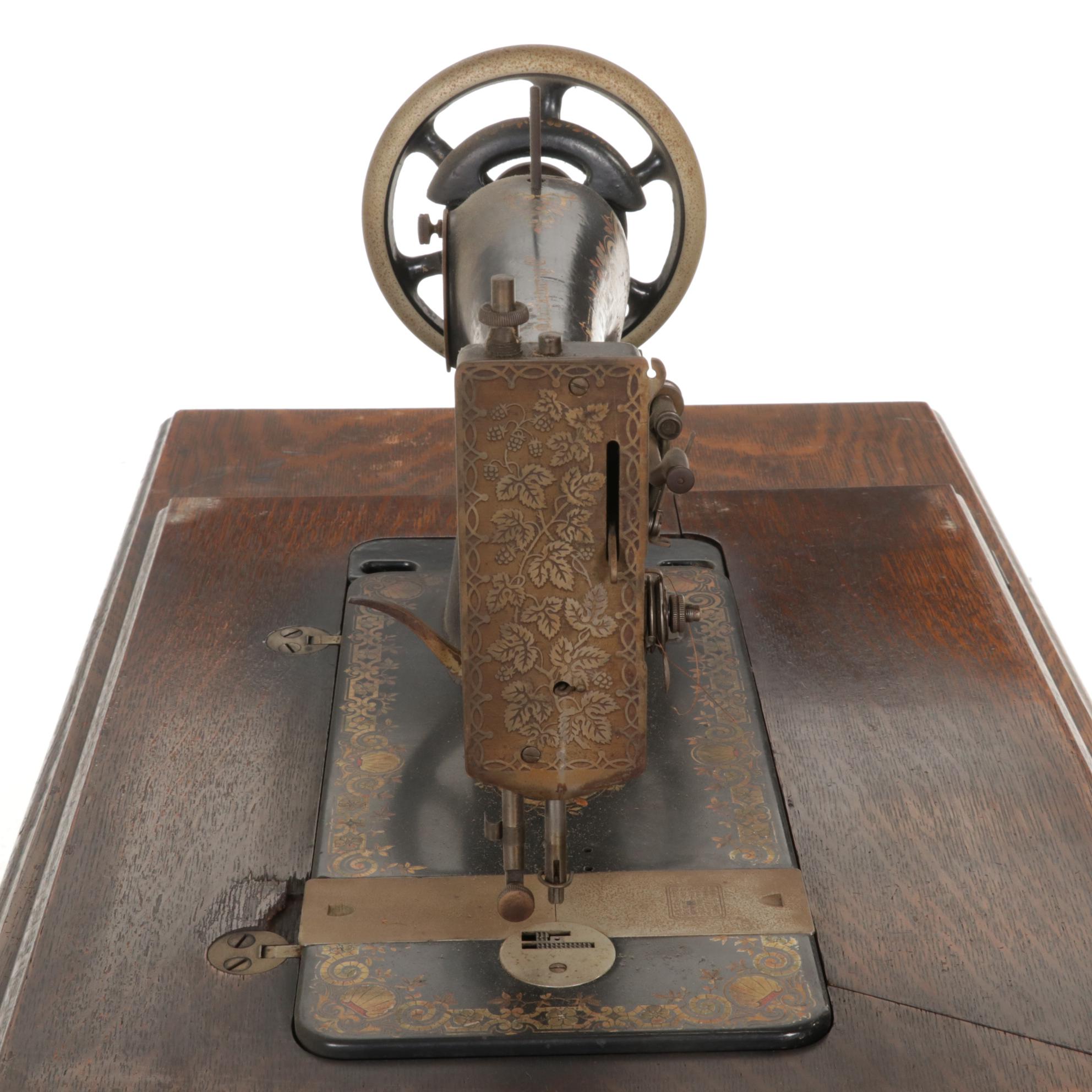 Singer Model 27-4 Treadle Sewing Machine in Oak and Iron Cabinet, Circa 1906