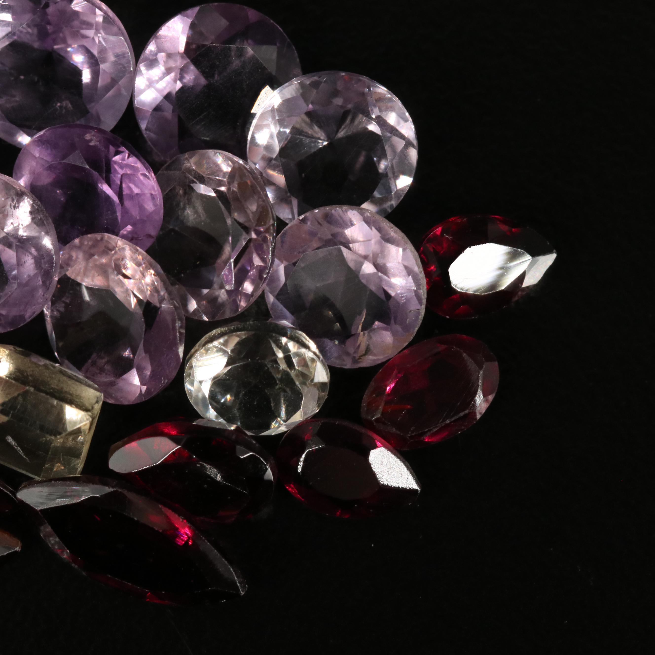 Loose 20.42 CTW Amethyst, Citrine, and Garnet Lot