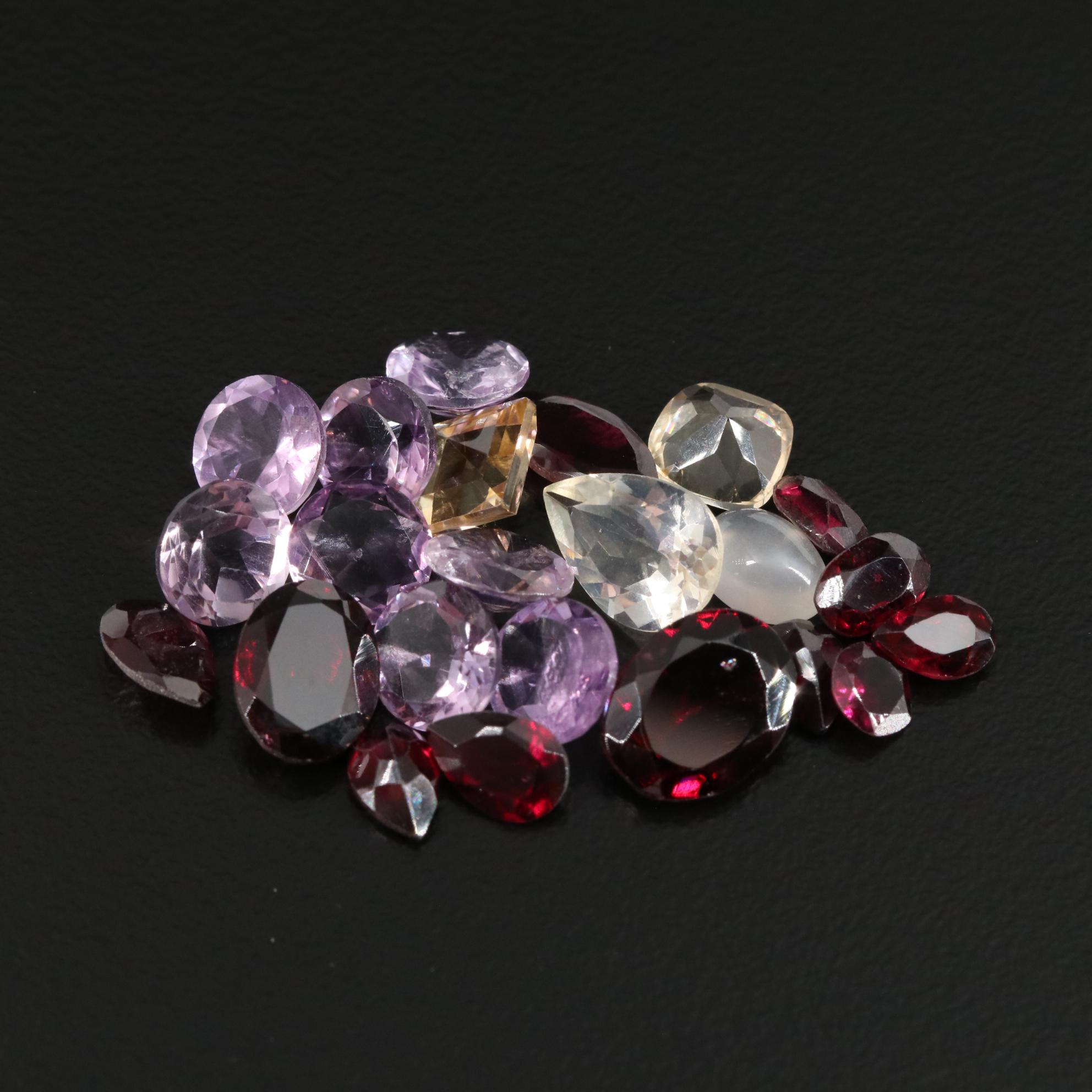 Loose 24.55 CTW Amethyst, Citrine and Garnet Lot