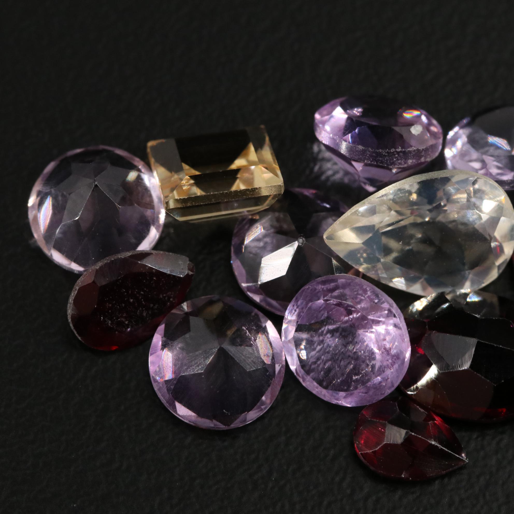 Loose 24.55 CTW Amethyst, Citrine and Garnet Lot
