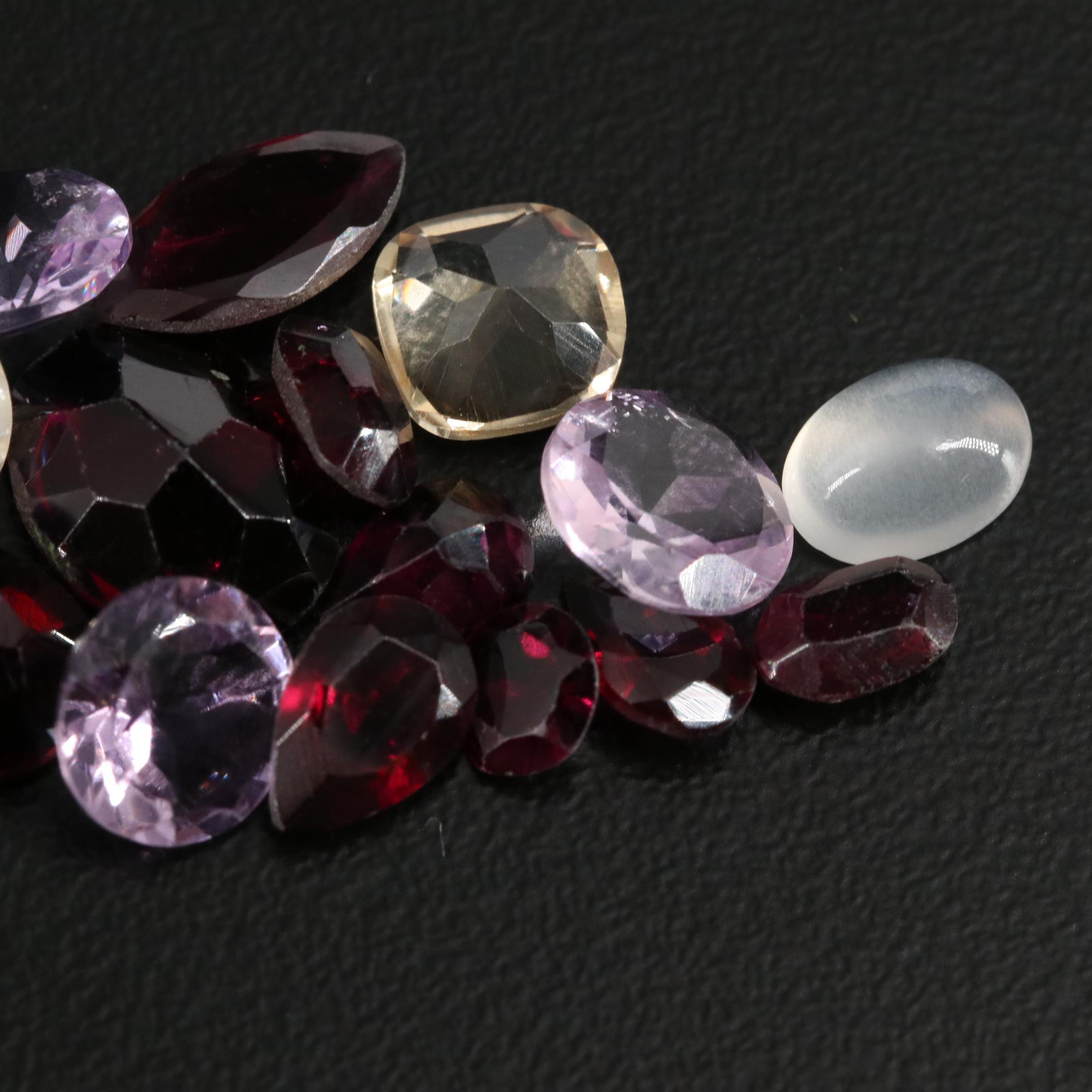 Loose 24.55 CTW Amethyst, Citrine and Garnet Lot