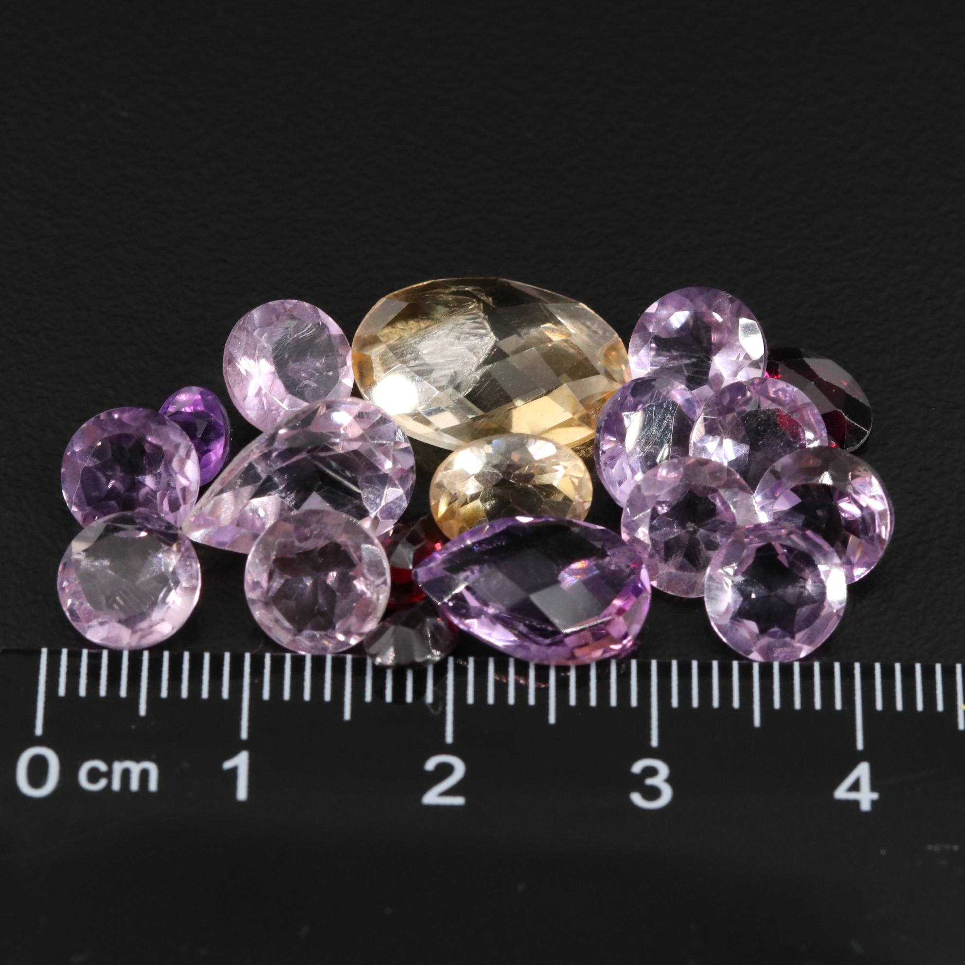 Loose 23.81 CTW Amethyst, Citrine and Garnet Lot