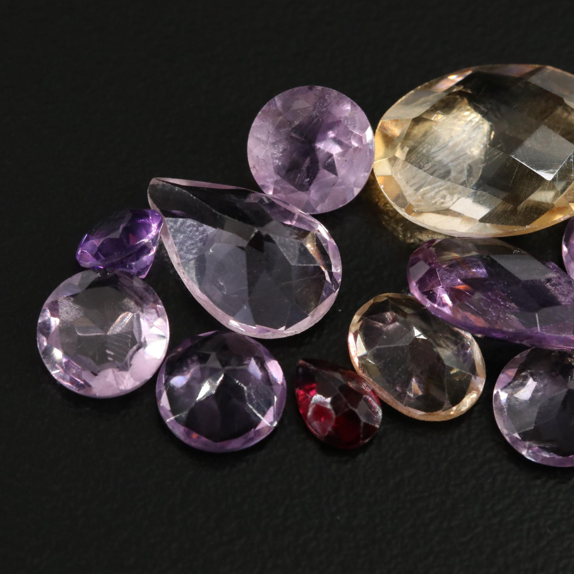 Loose 23.81 CTW Amethyst, Citrine and Garnet Lot