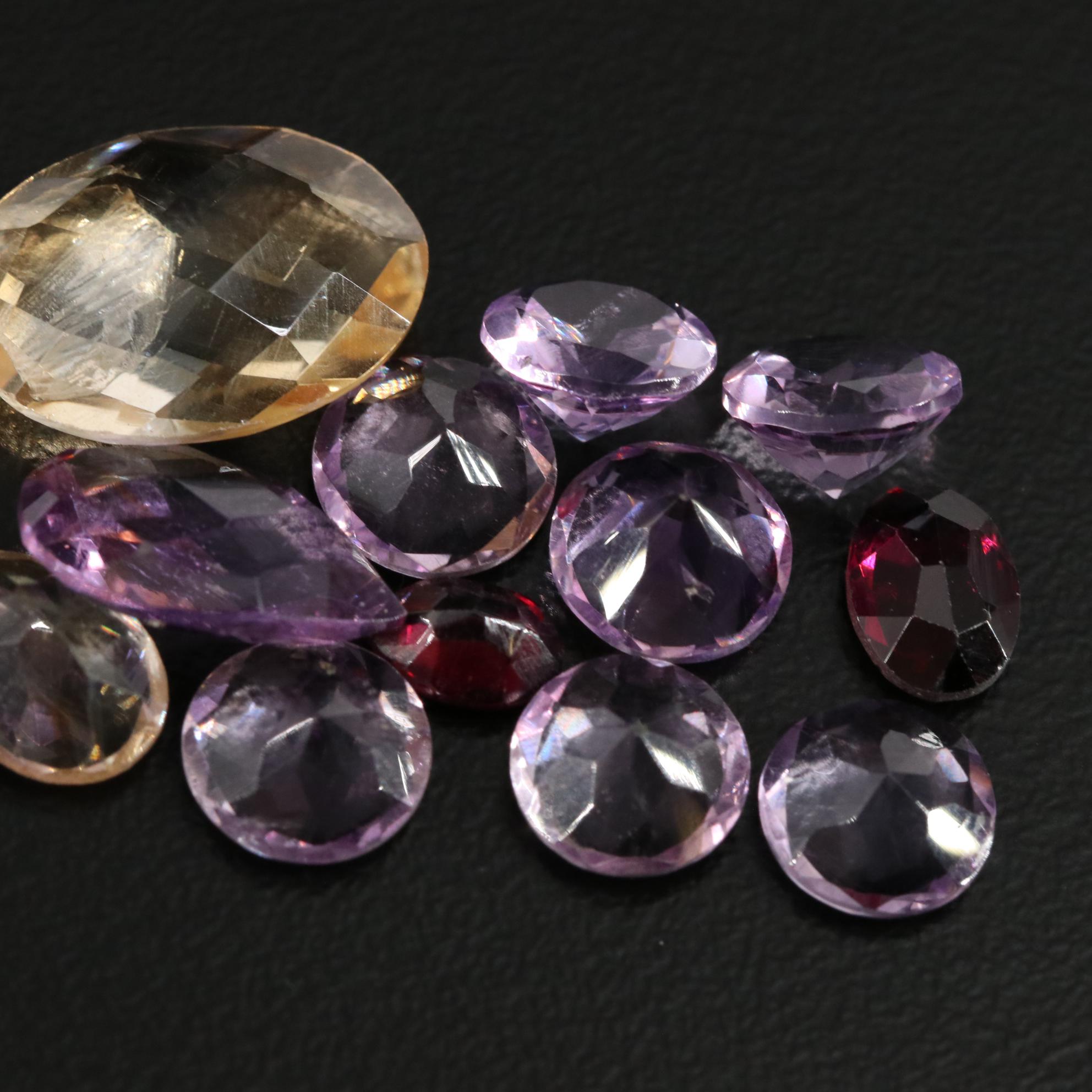 Loose 23.81 CTW Amethyst, Citrine and Garnet Lot