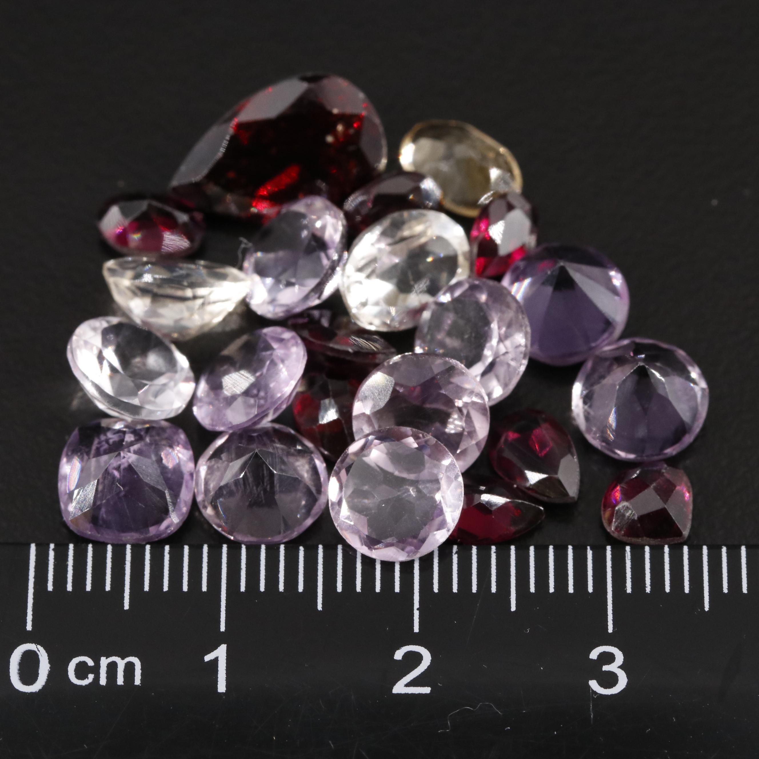 Loose 22.85 CTW Amethyst, Citrine and Garnet Lot