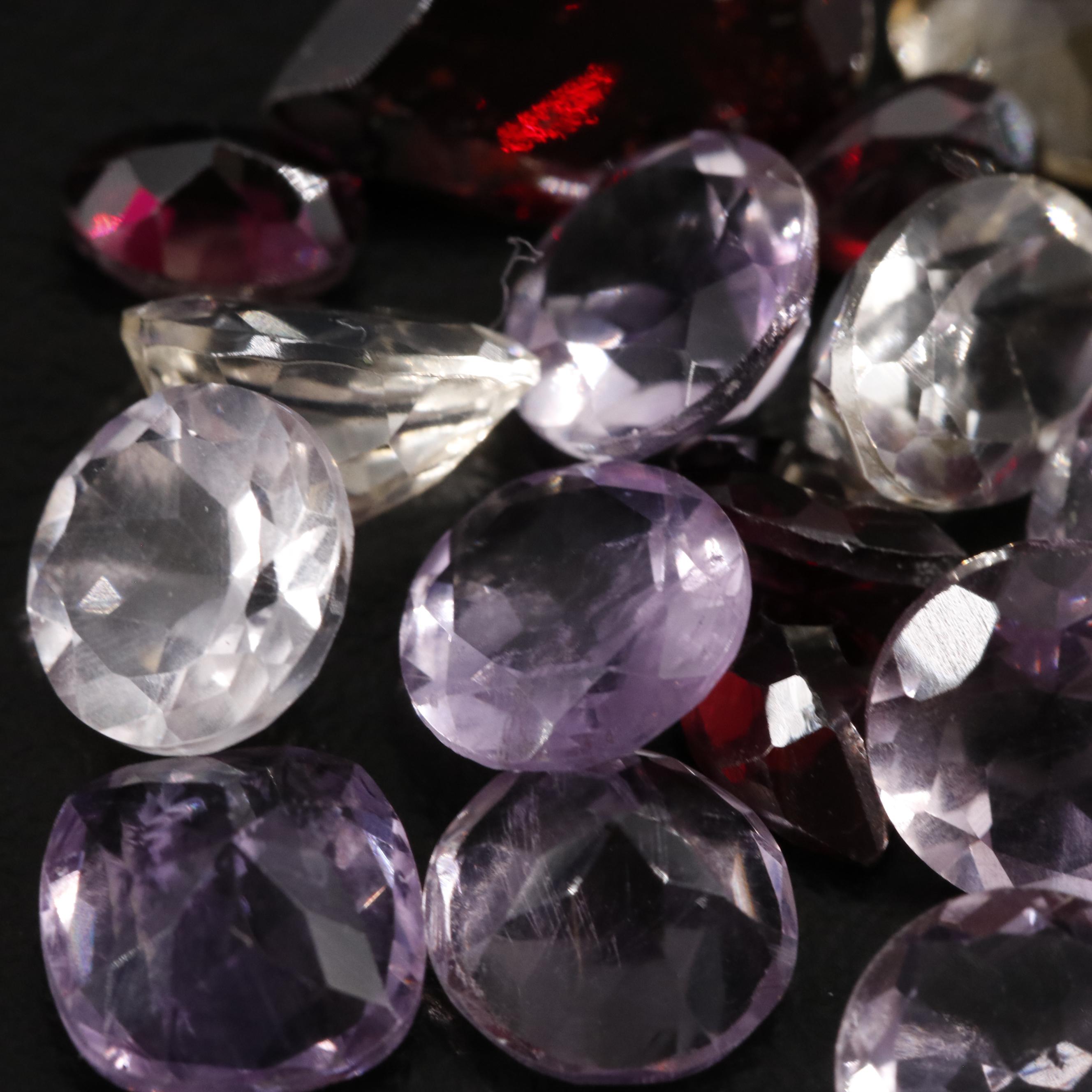 Loose 22.85 CTW Amethyst, Citrine and Garnet Lot