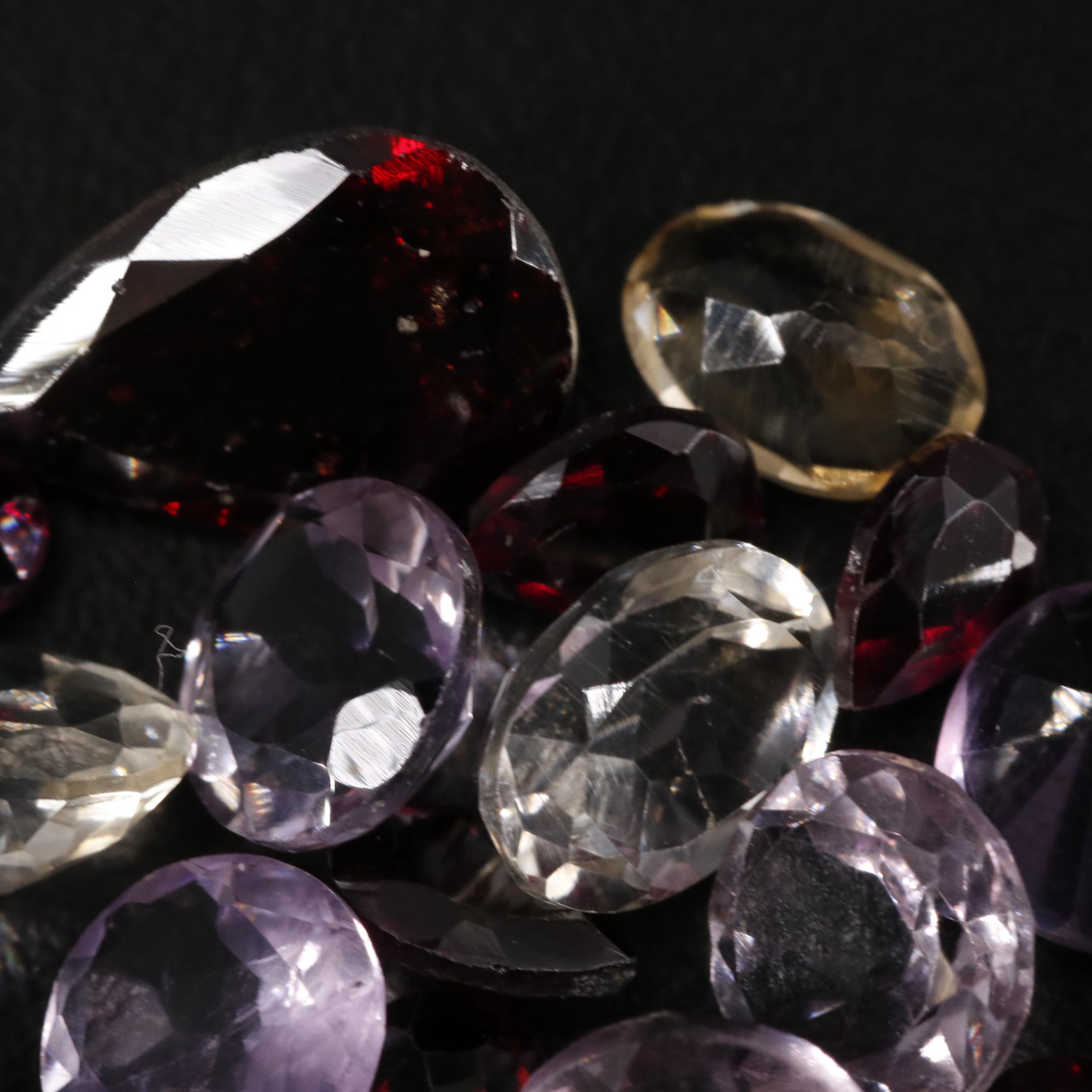 Loose 22.85 CTW Amethyst, Citrine and Garnet Lot