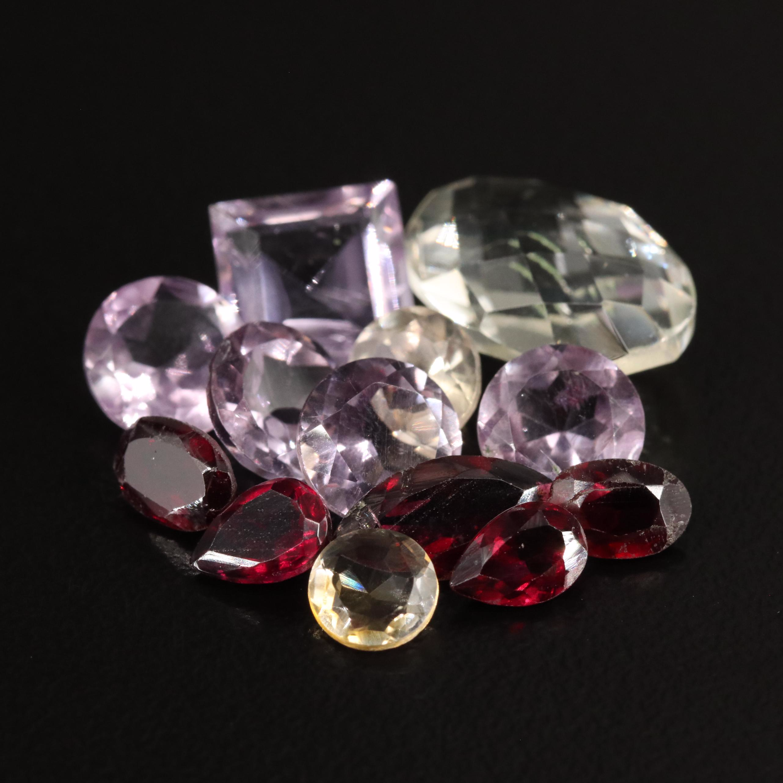 Loose 17.62 CTW Amethyst, Citrine, and Garnet lot