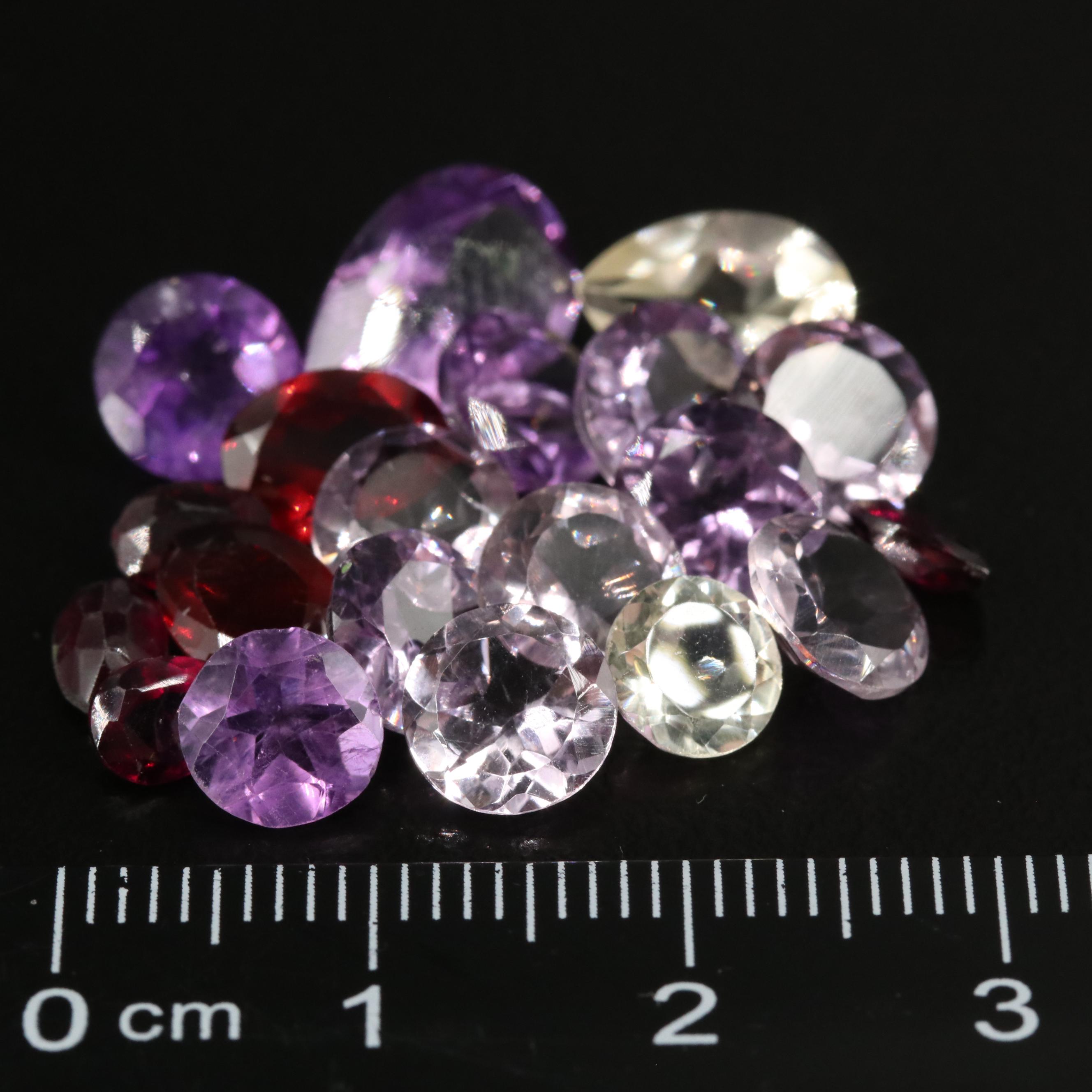 Loose 21.05 CTW Amethyst, Citrine, and Garnet Lot