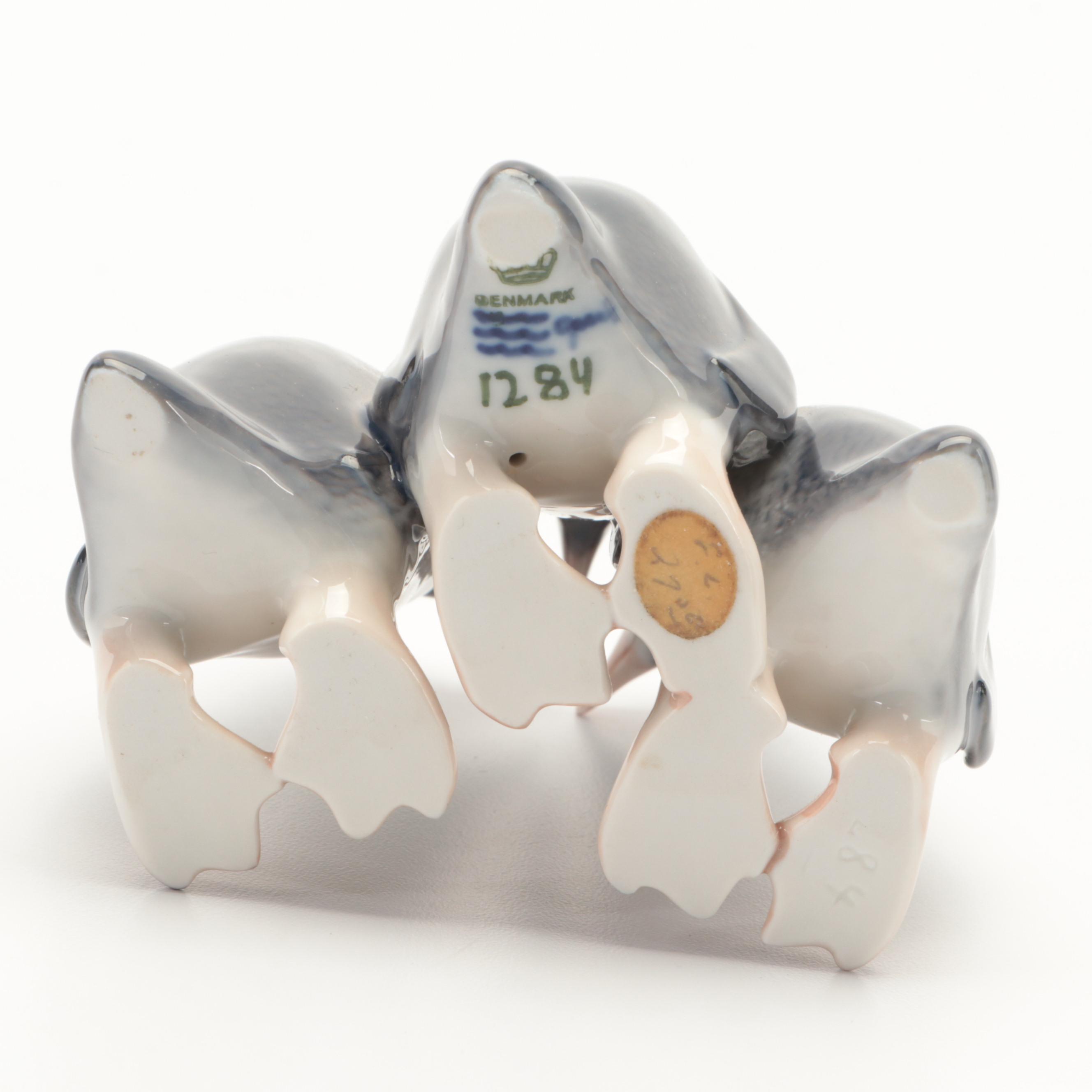 Royal Copenhagen "Penguin" and "Penguins Trio" Porcelain Figurines