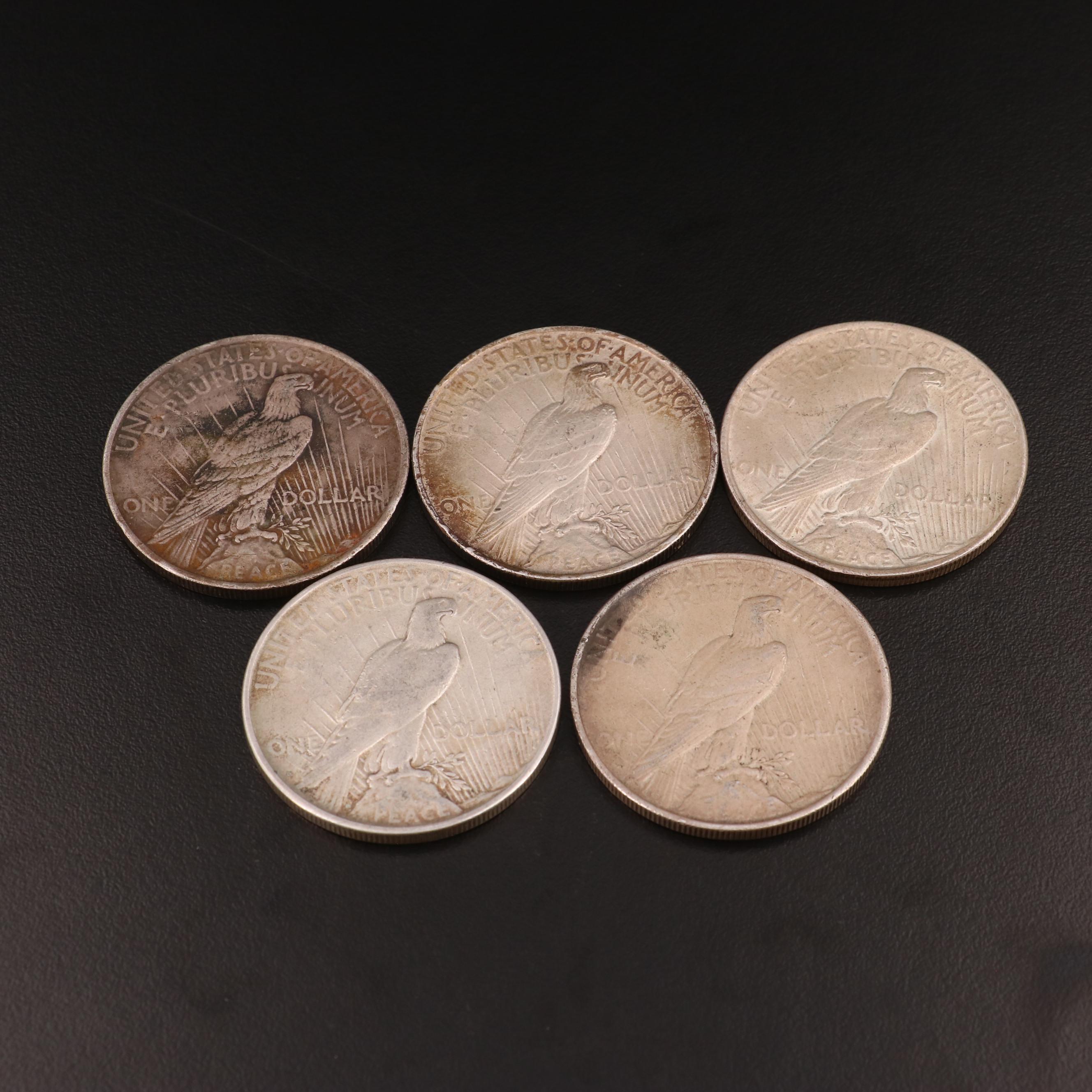 Five Peace Silver Dollars