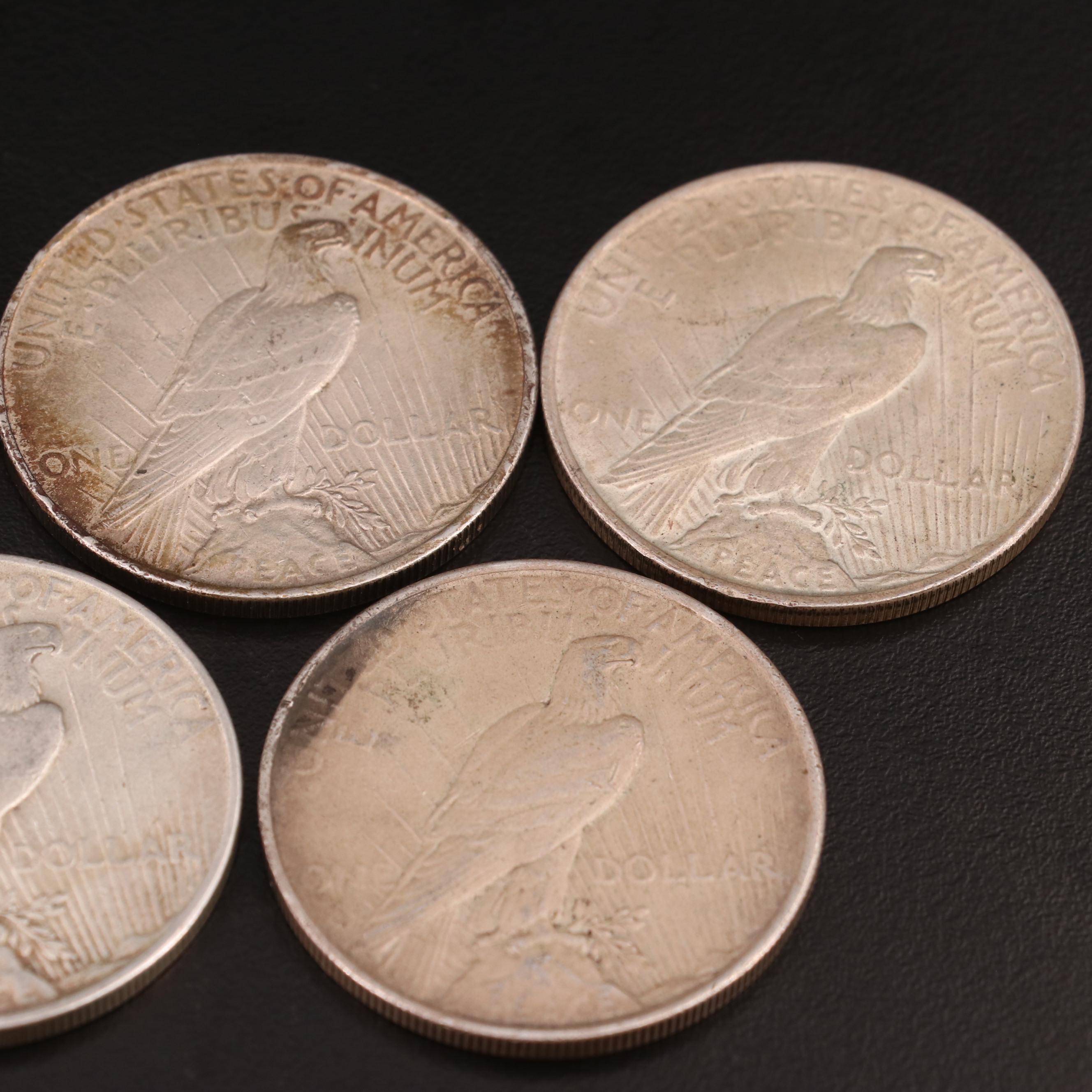Five Peace Silver Dollars