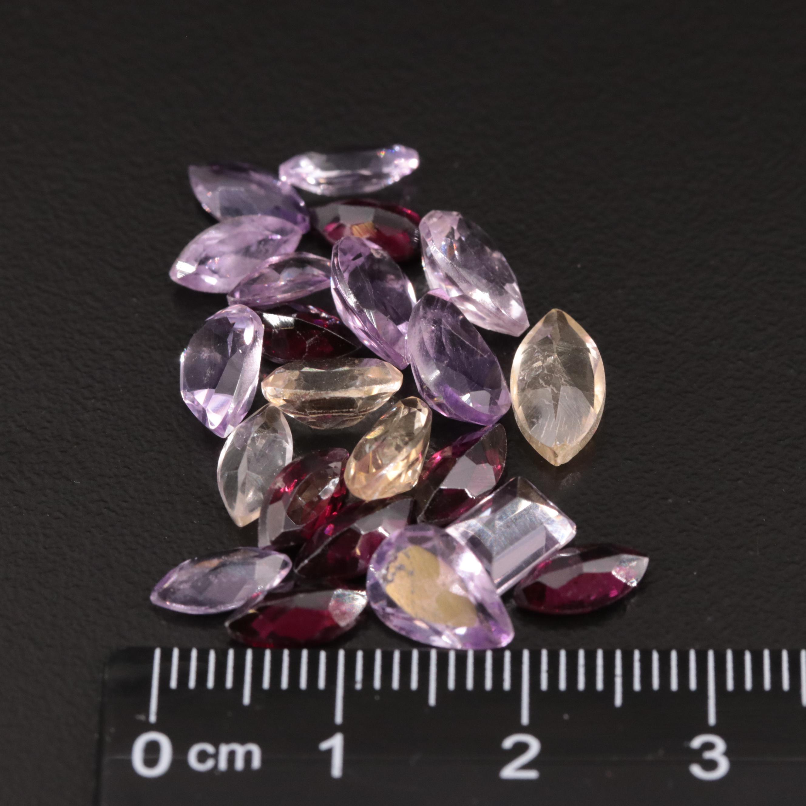 Loose 18.45 CTW Amethyst, Citrine and Garnet Lot