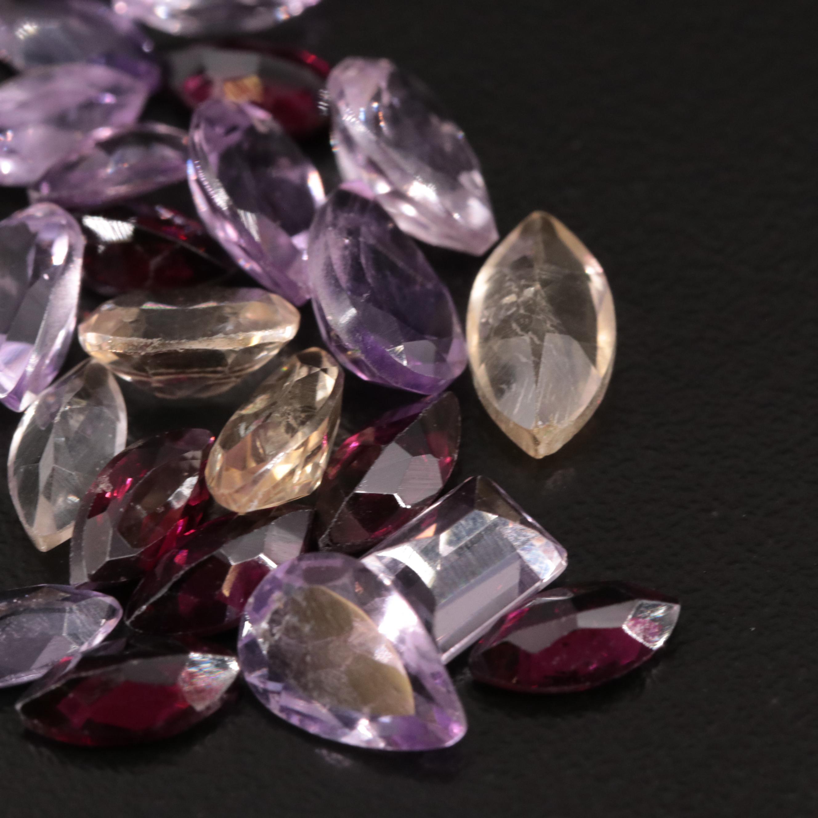 Loose 18.45 CTW Amethyst, Citrine and Garnet Lot