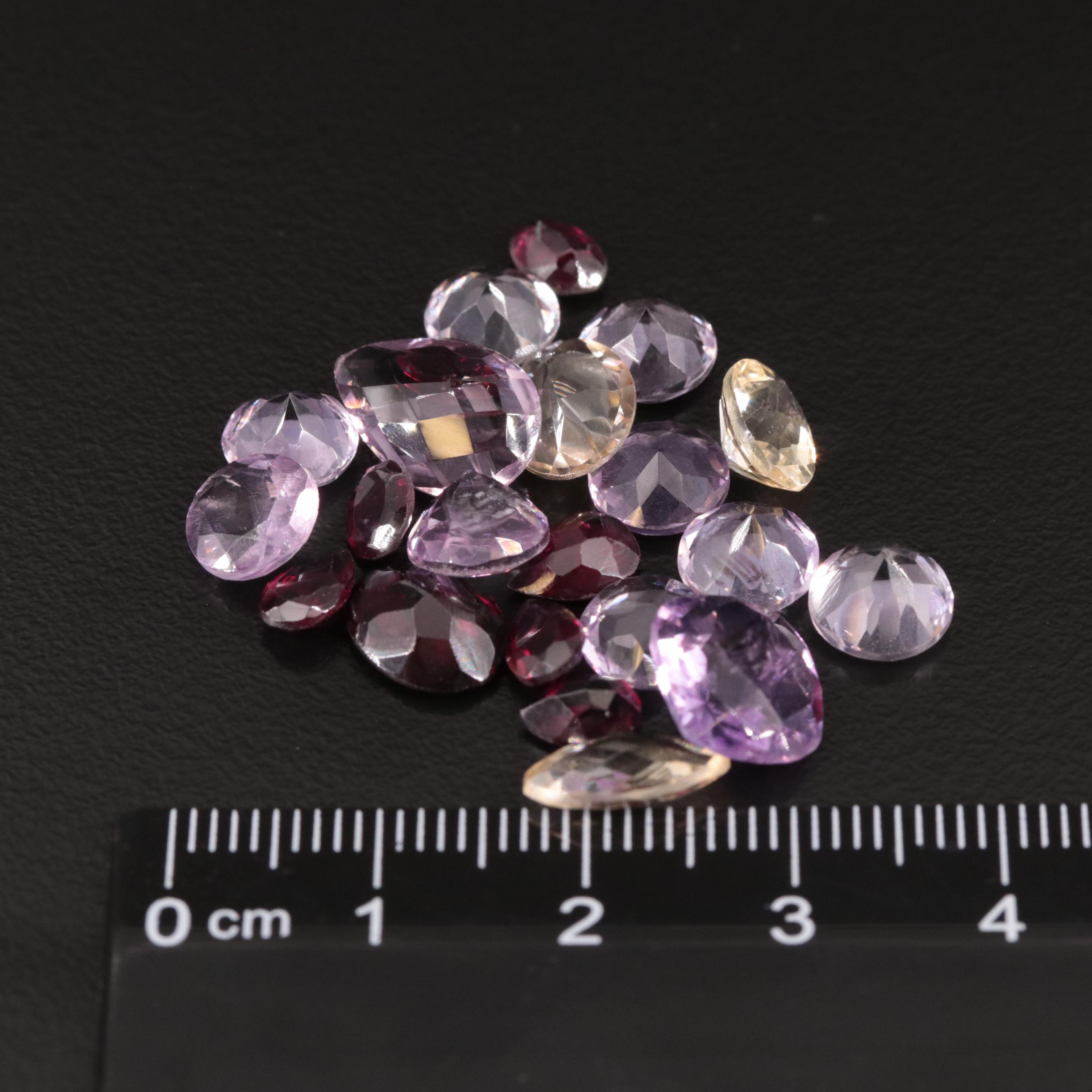 Loose 24.15 CTW Amethyst, Citrine and Garnet Lot