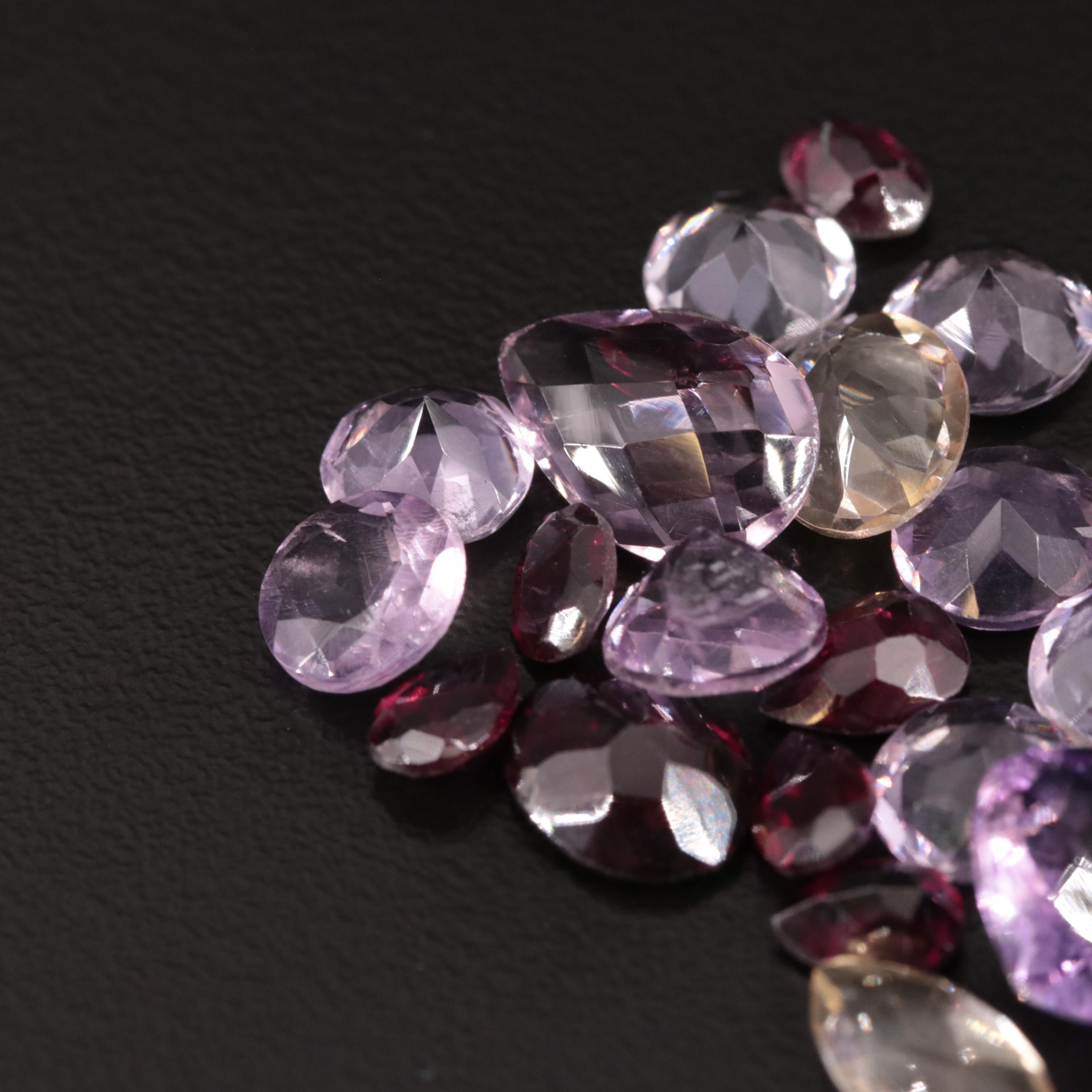 Loose 24.15 CTW Amethyst, Citrine and Garnet Lot