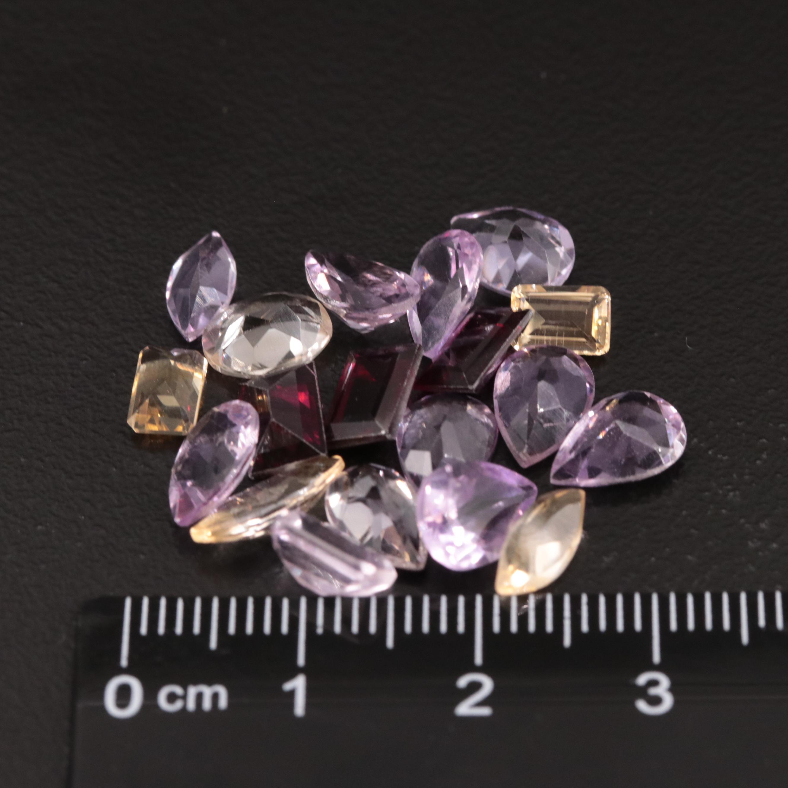 Loose 17.36 CTW Amethyst, Citrine and Garnet Lot