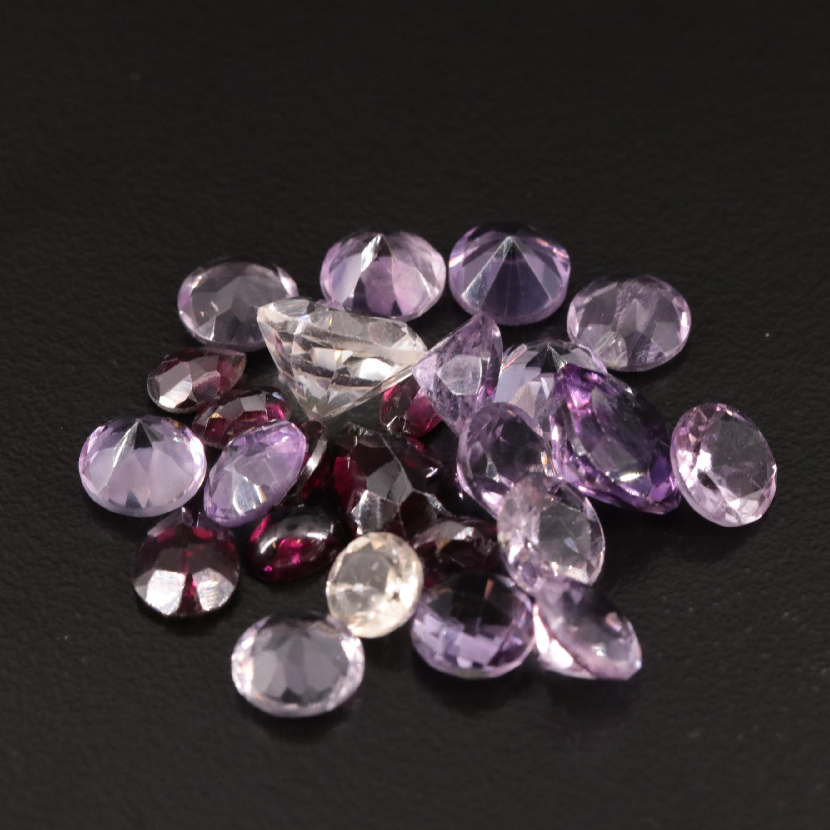 Loose 31.85 CTW Amethyst, Citrine, and Garnet Lot