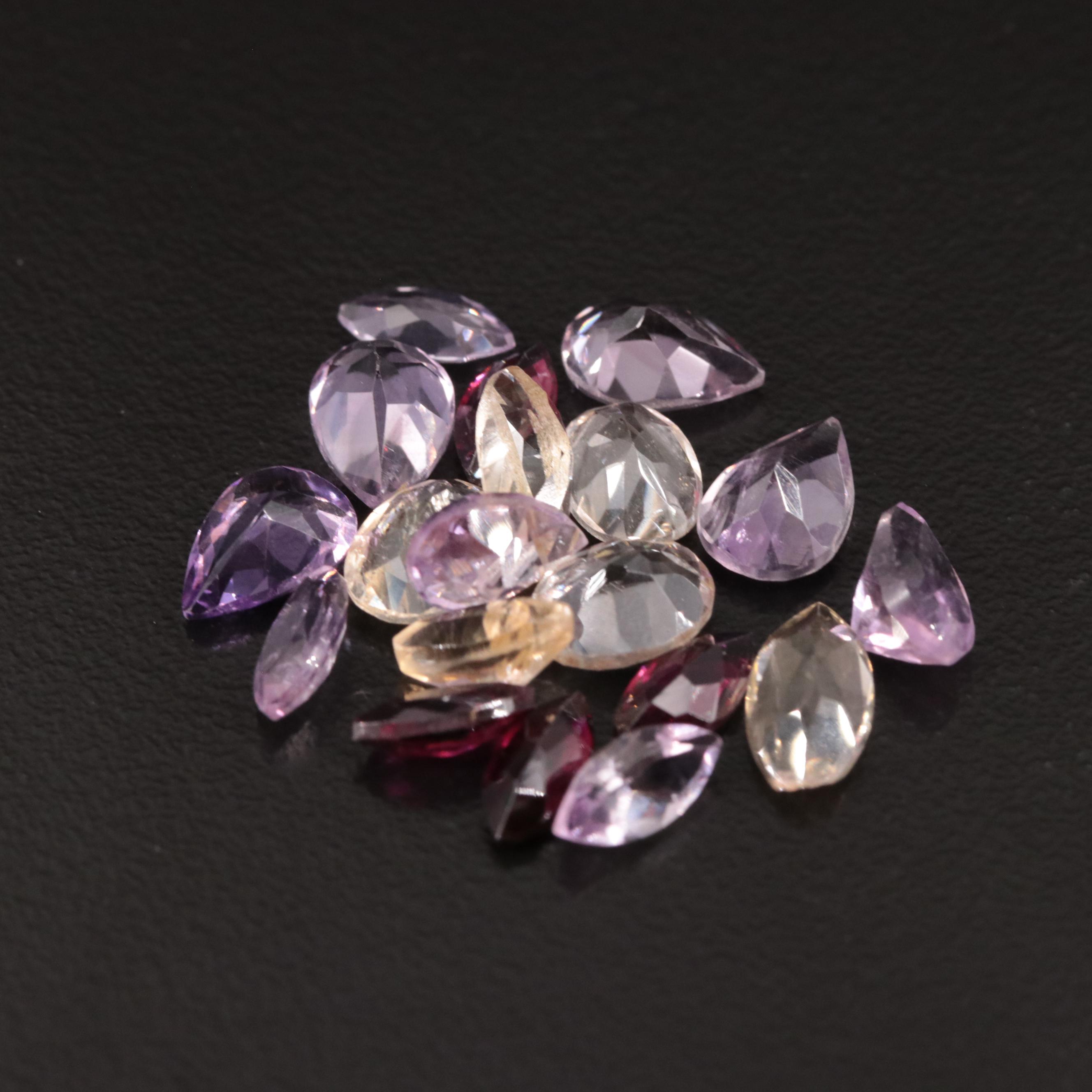 Loose 16.62 CTW Amethyst, Citrine, and Garnet Lot