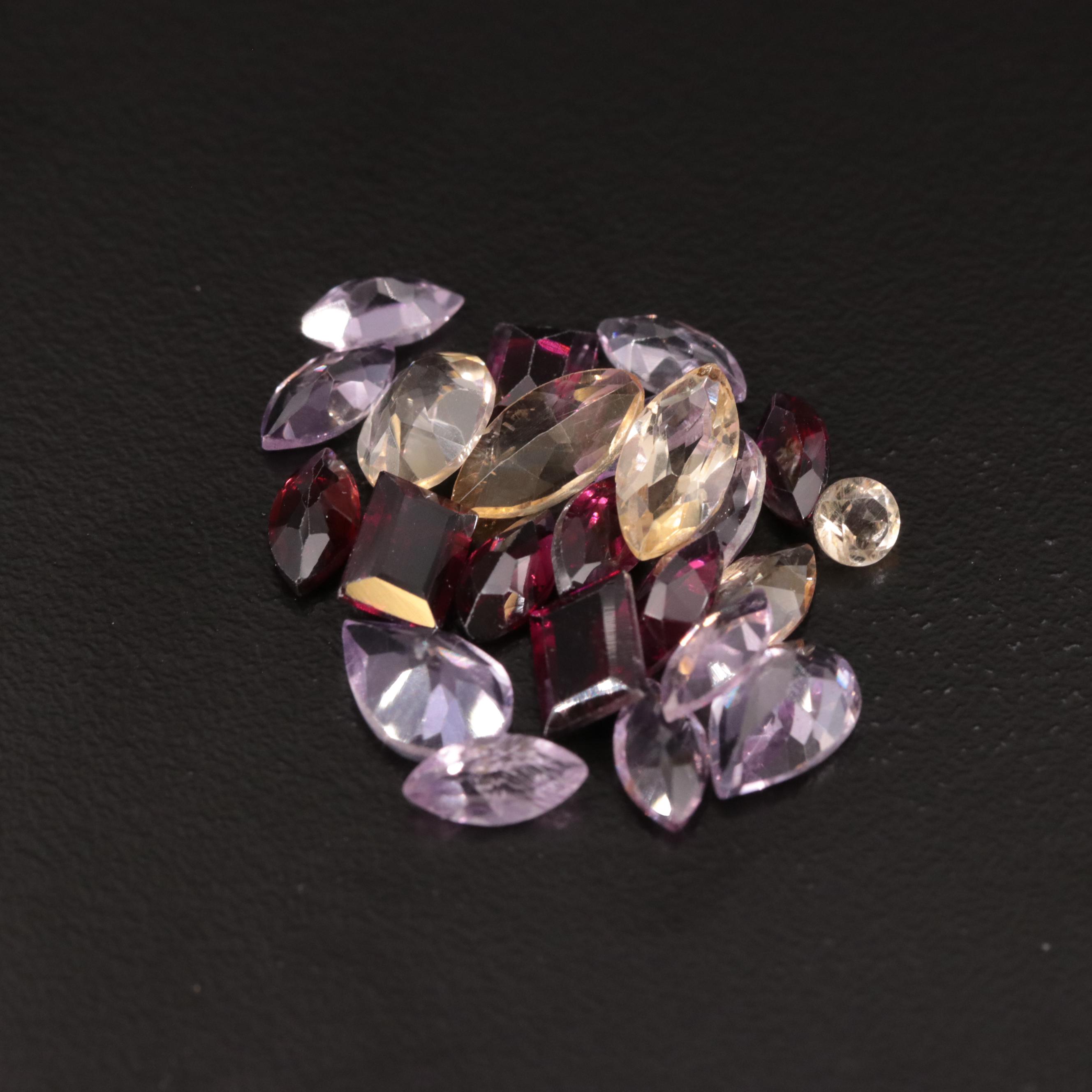 Loose 17.61 CTW Amethyst, Citrine, and Garnet Lot