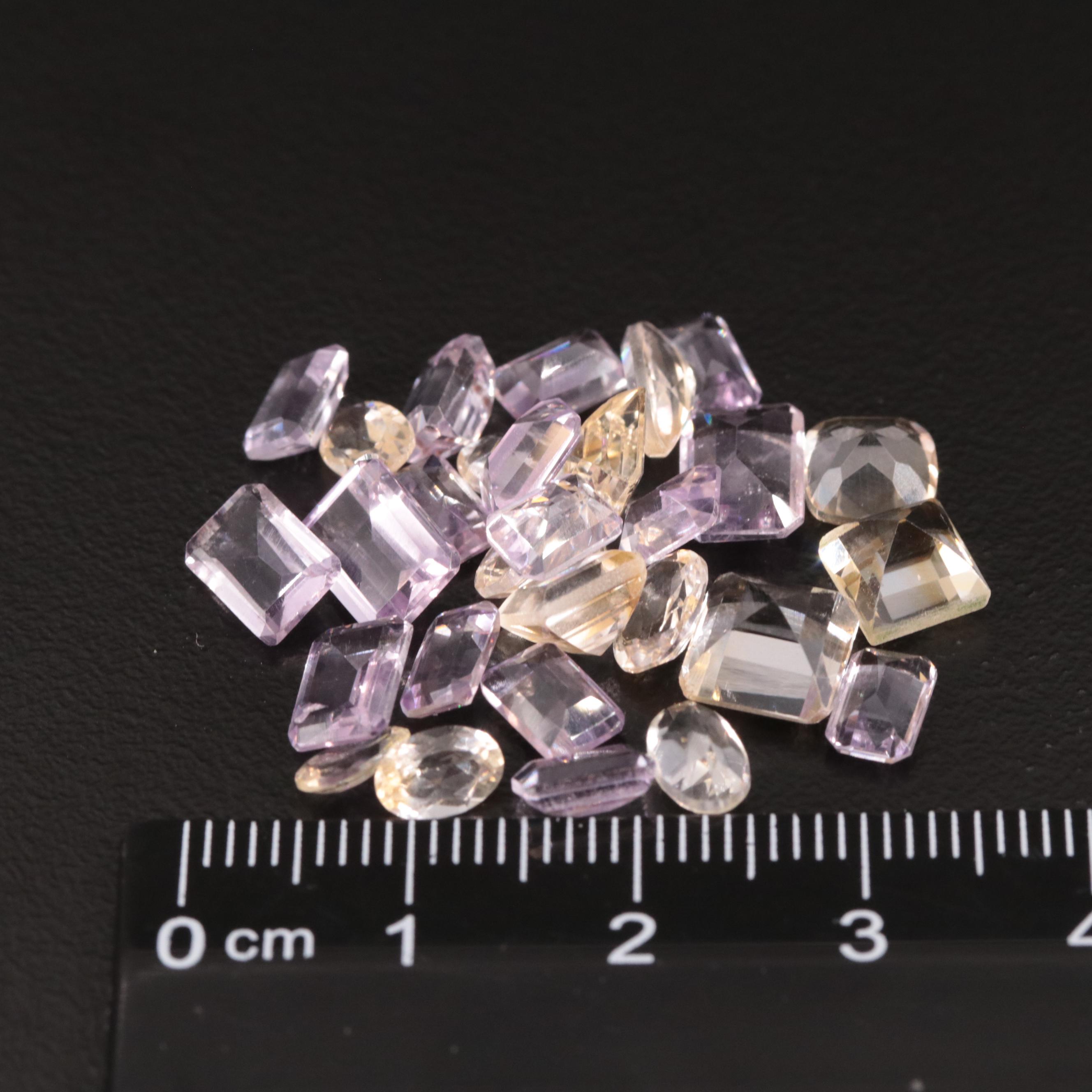 Loose 19.70 CTW Amethyst and Citrine Lot