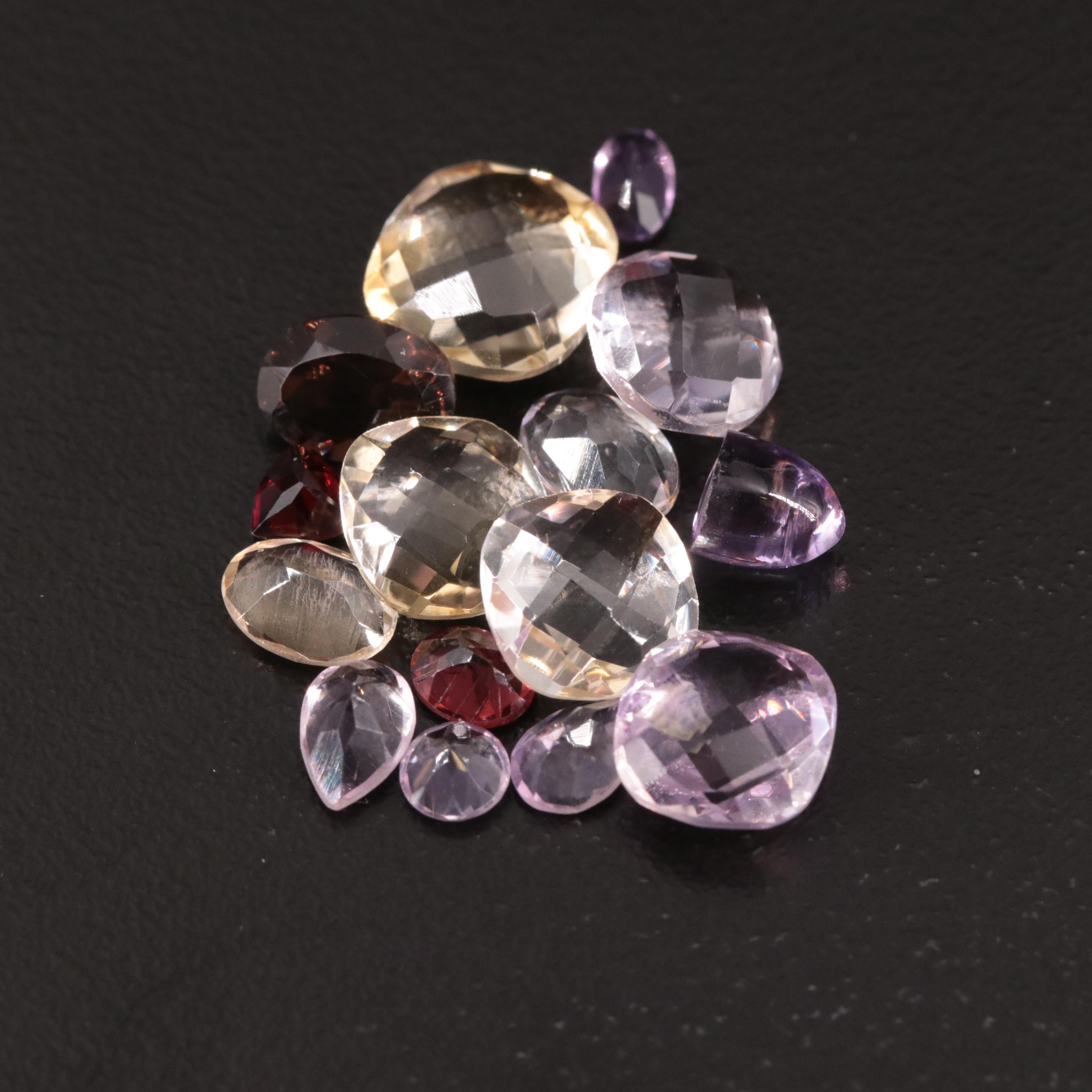 Loose 16.76 CTW Amethyst, Citrine, and Garnet Lot