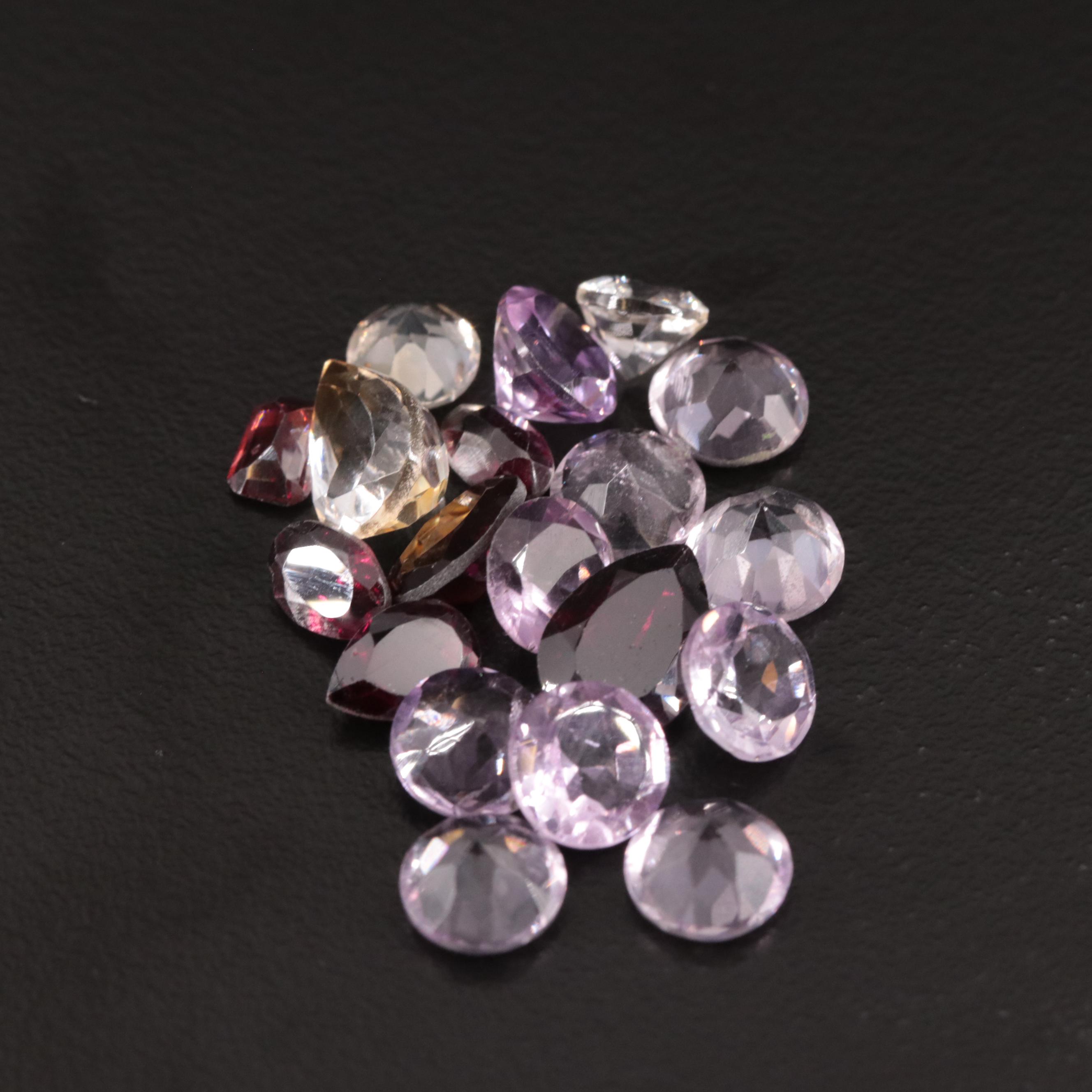 Loose 21.52 CTW Amethyst, Citrine, and Garnet Lot