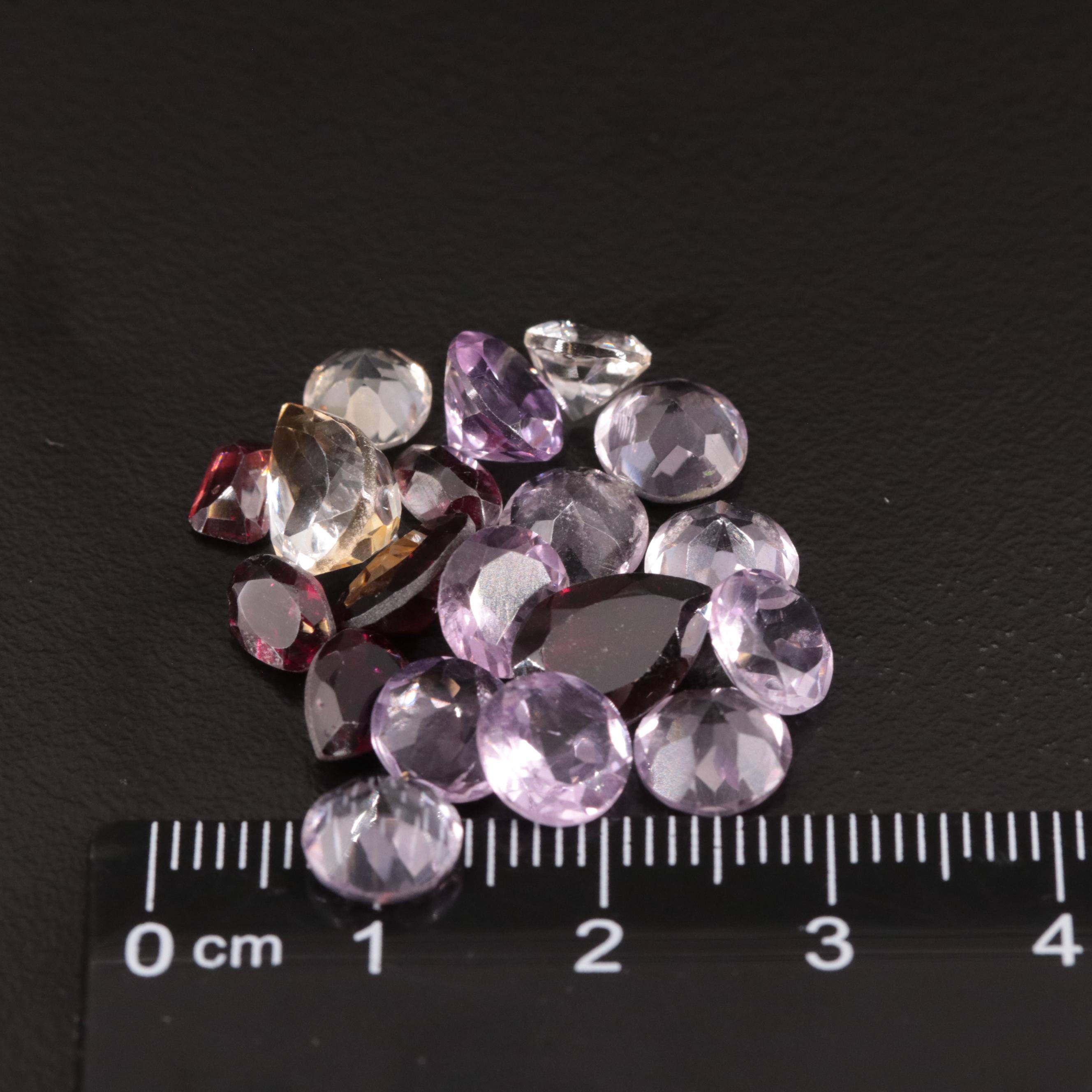 Loose 21.52 CTW Amethyst, Citrine, and Garnet Lot